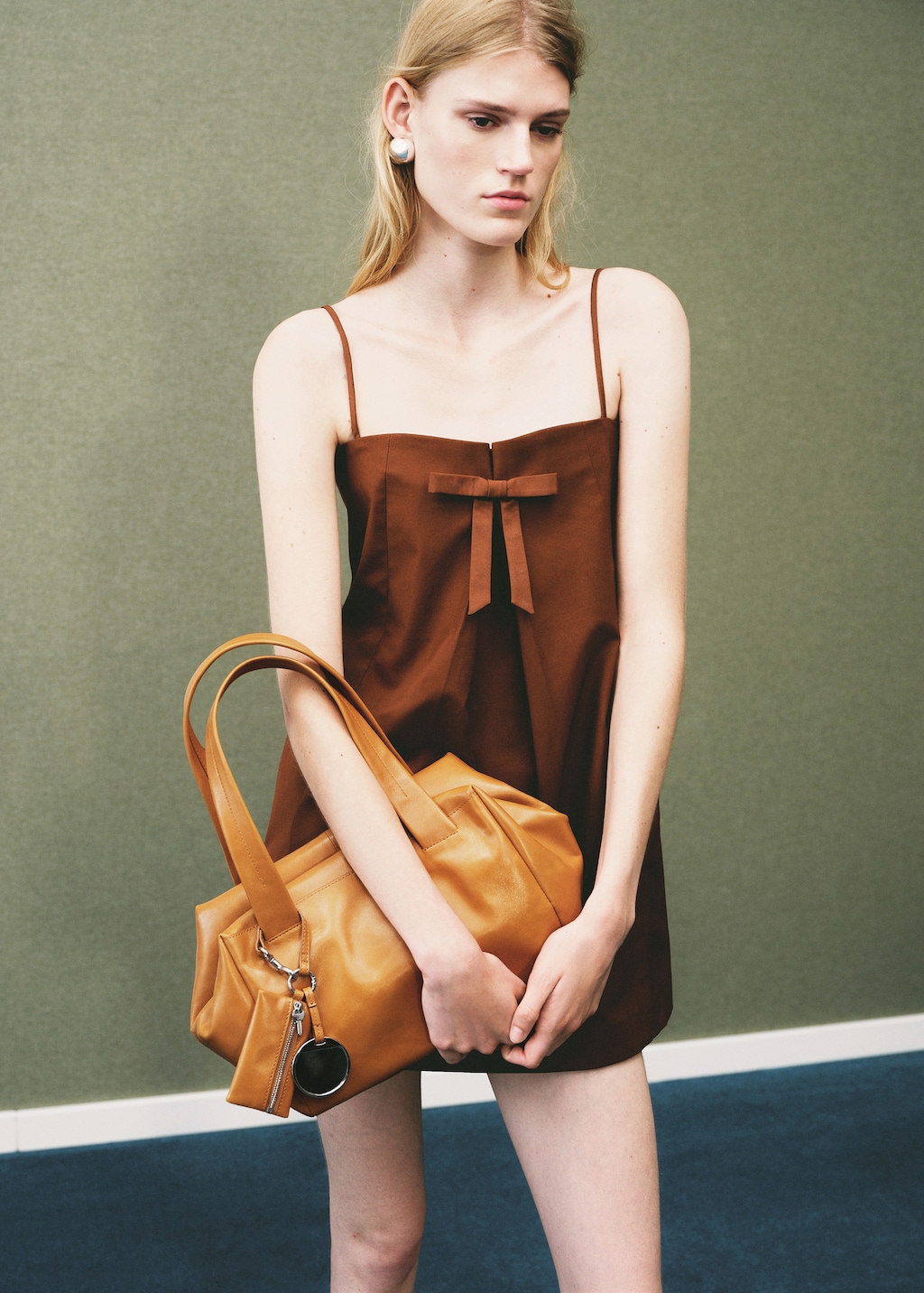 Dress with bow neckline