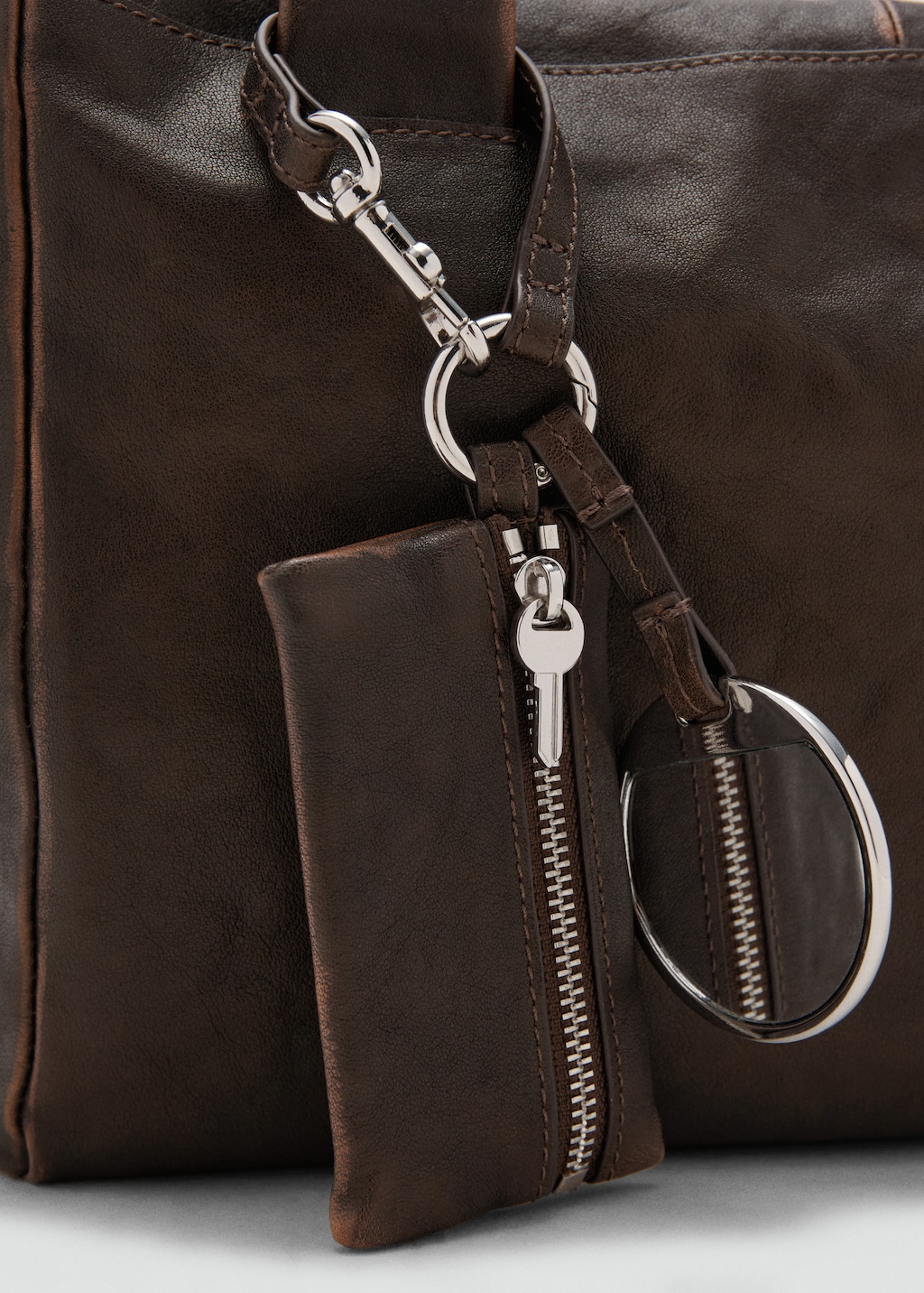 Medium leather shoulder bag with charms