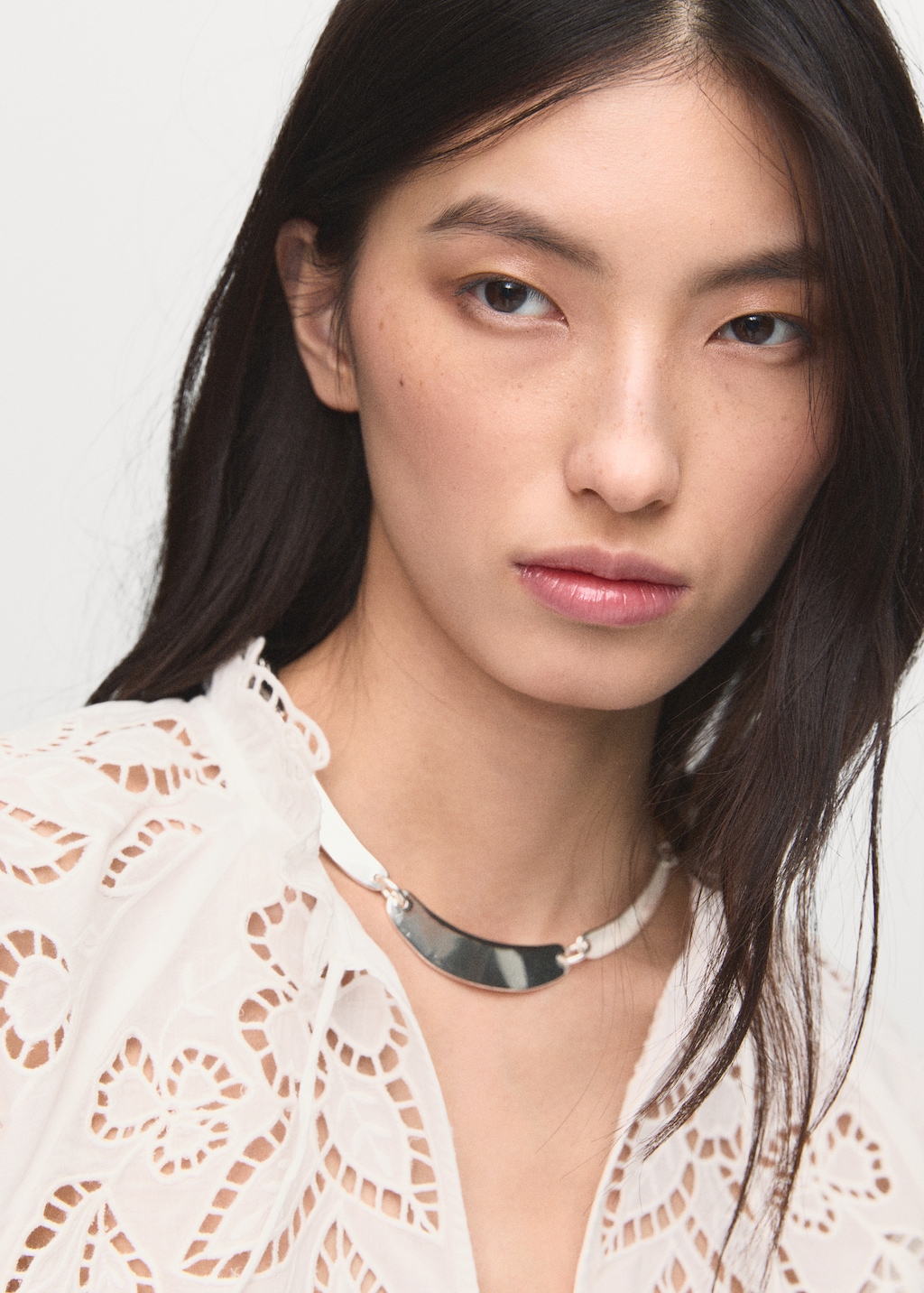 Embroidered blouse with bows