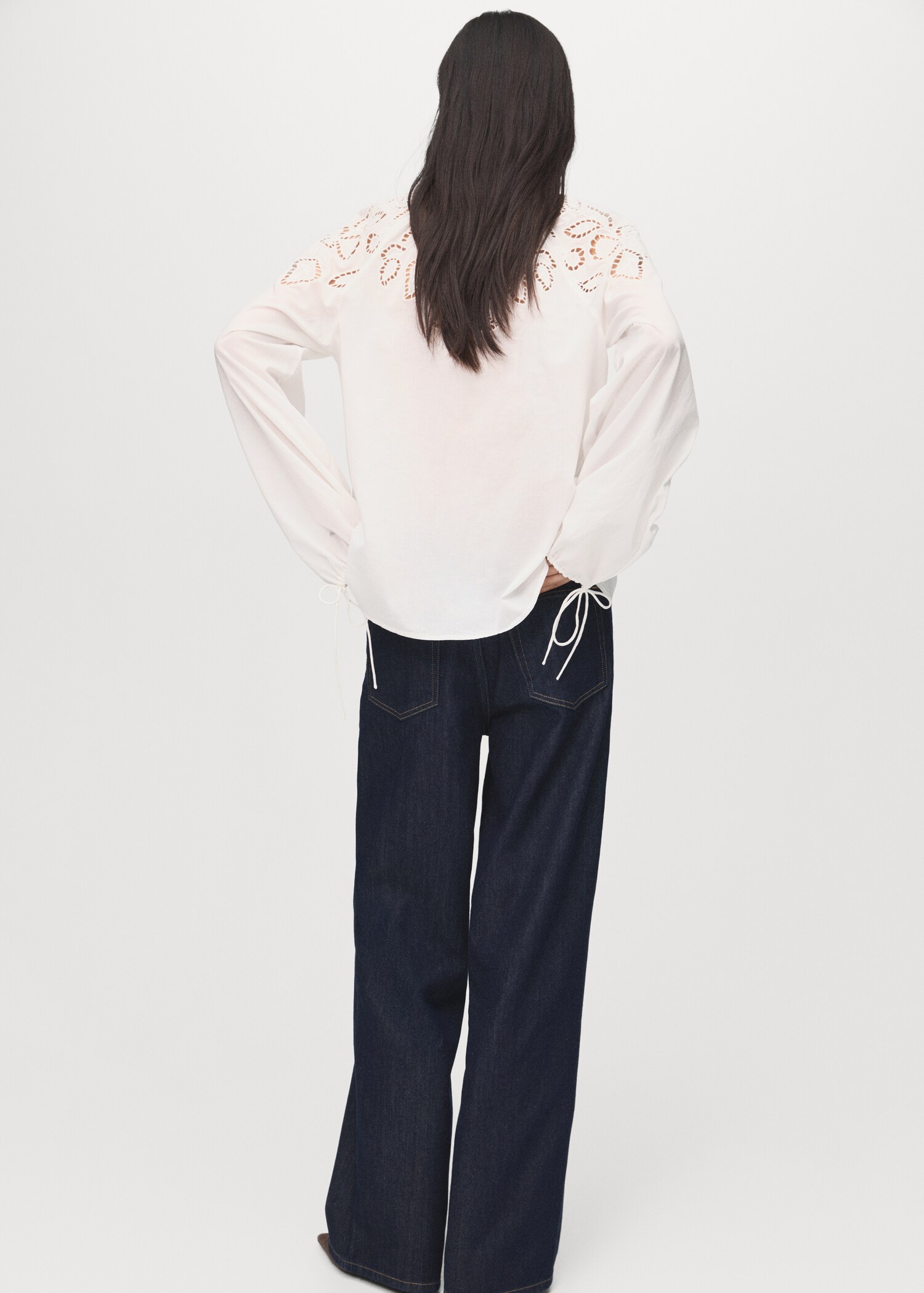 Embroidered blouse with bows - Reverse of the article