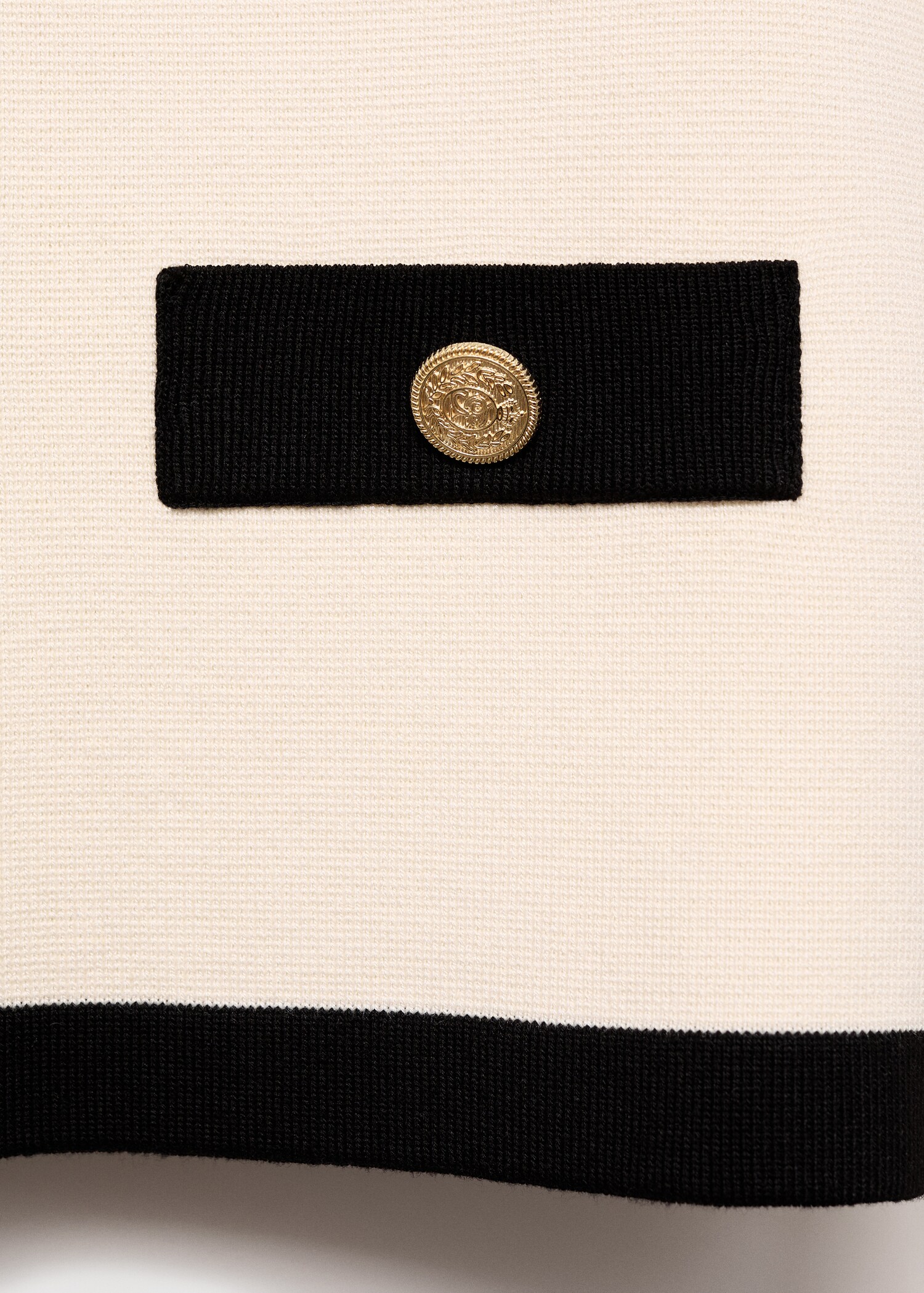 Gebreid jasje met contrasterende biesjes - Detail van het artikel 0