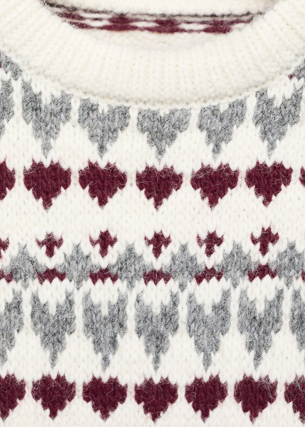 Knitted vest with heart pattern