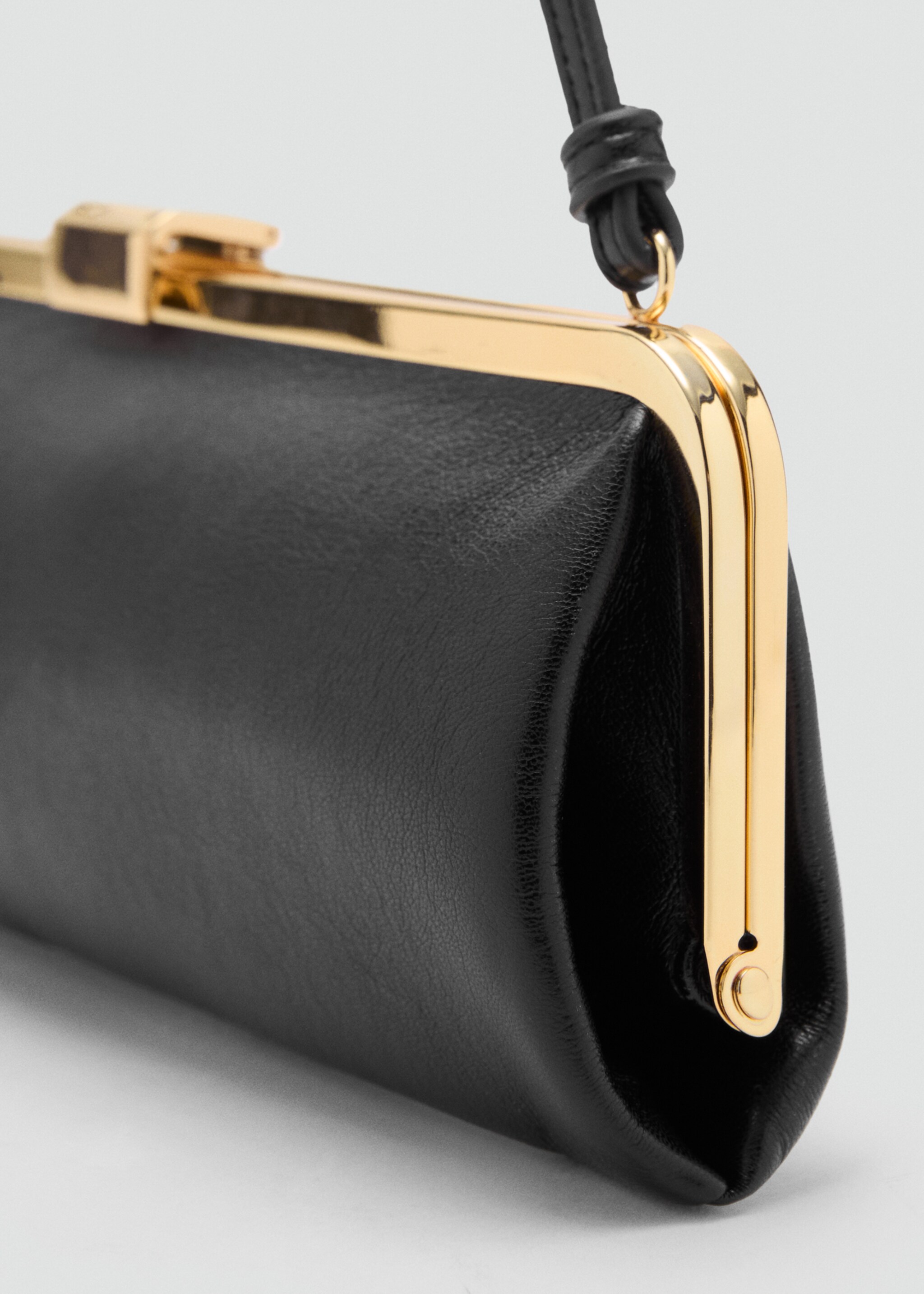 Metallic clutch handbag - Details of the article 1, Black. Ref: 17087769-00.