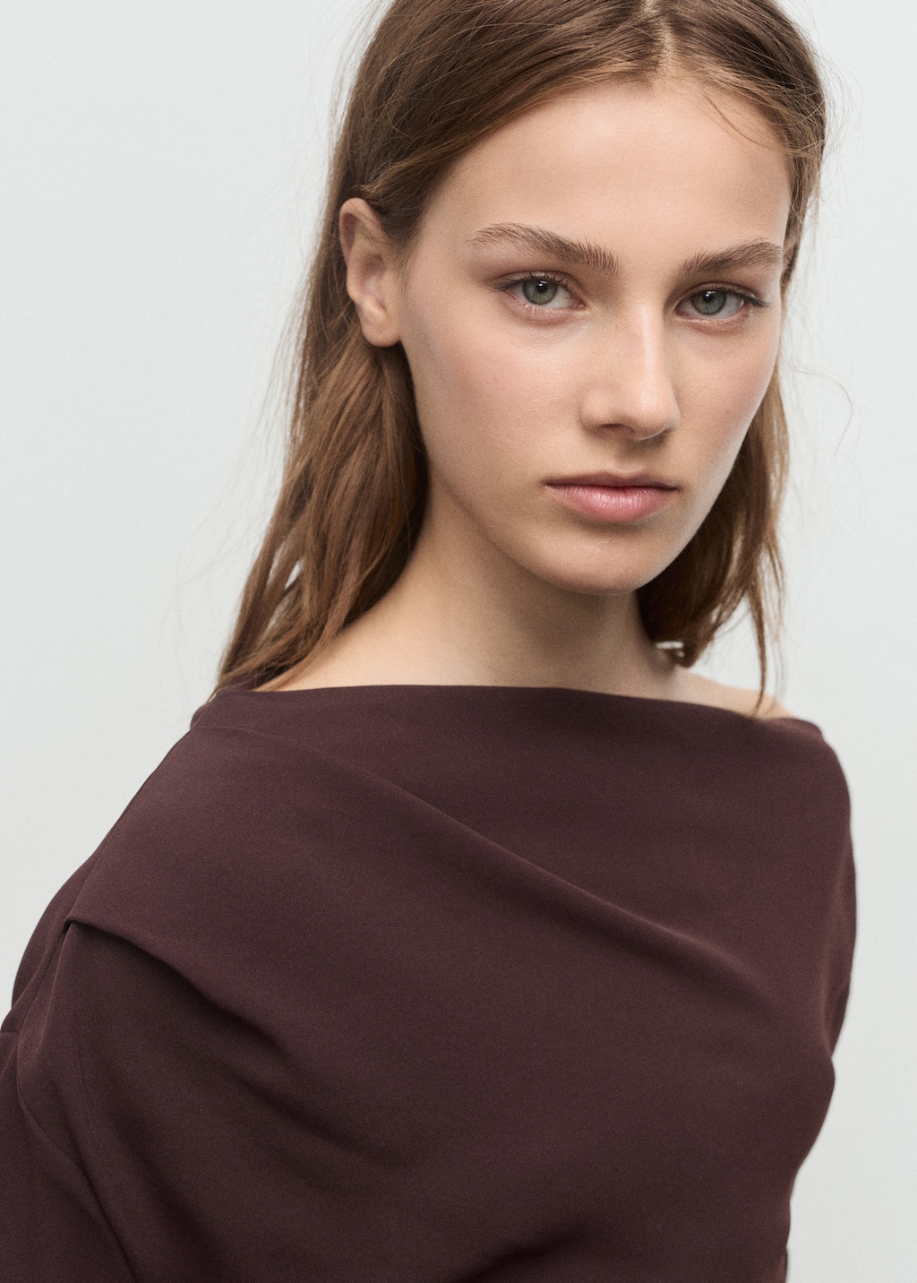 Blouse with asymmetrical neckline