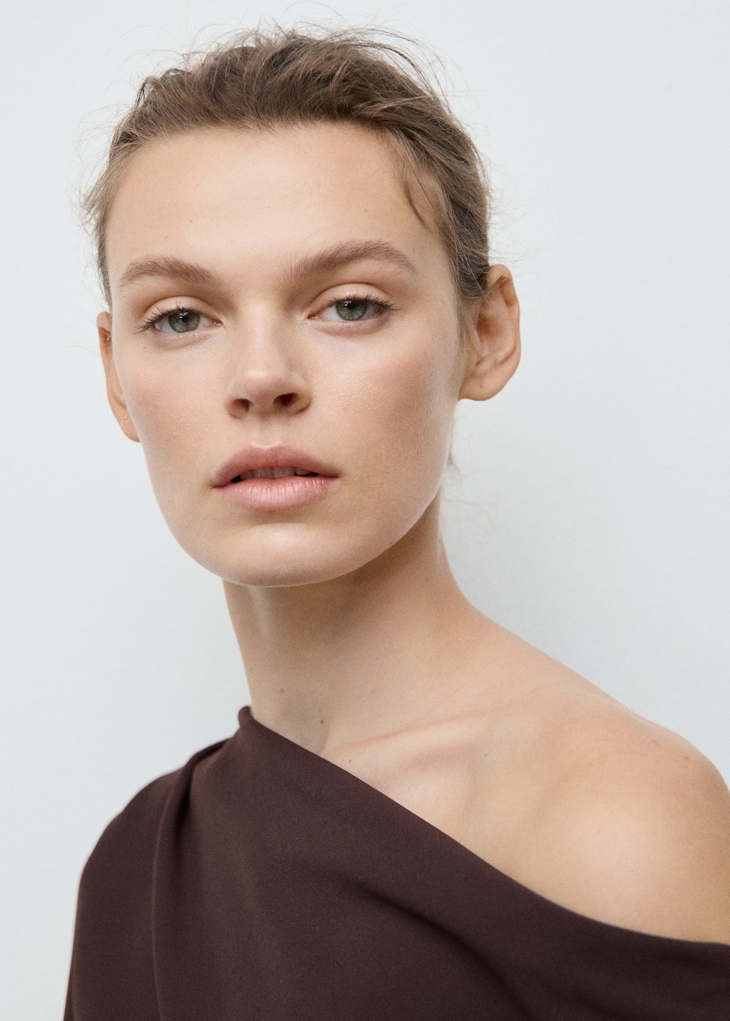 Blouse with asymmetrical neckline