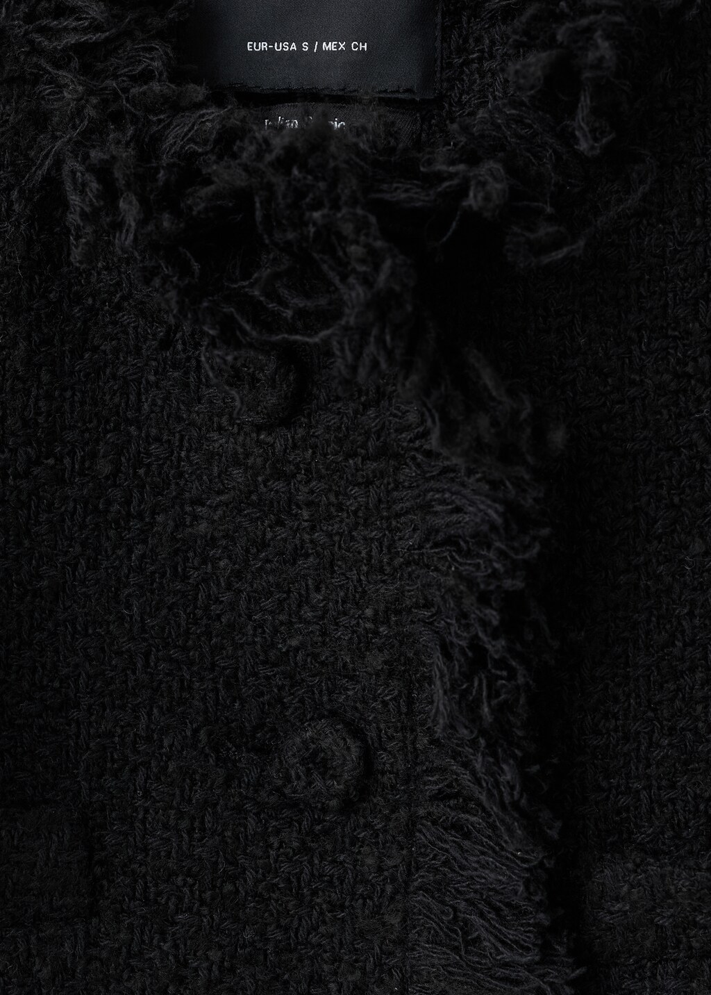 Tweed jacket with frayed ends