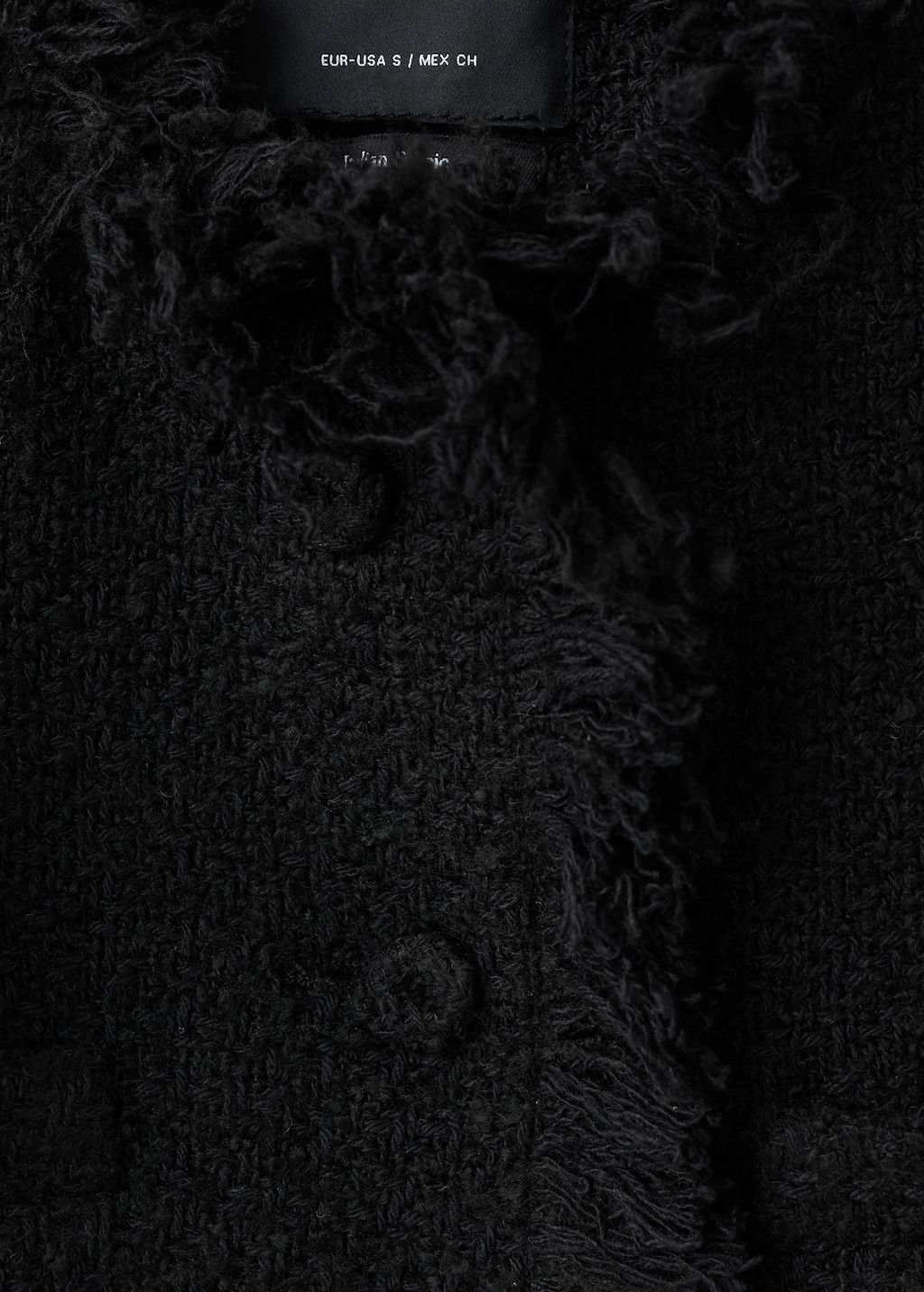 Tweed jacket with frayed ends