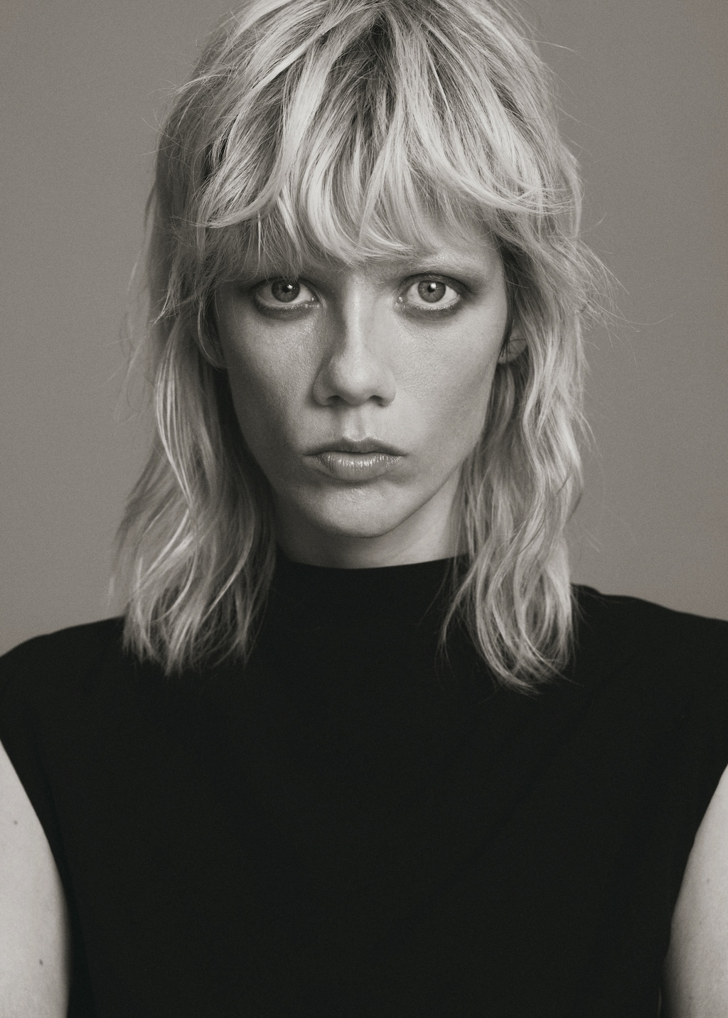 Jumpsuit with draped neck and belt