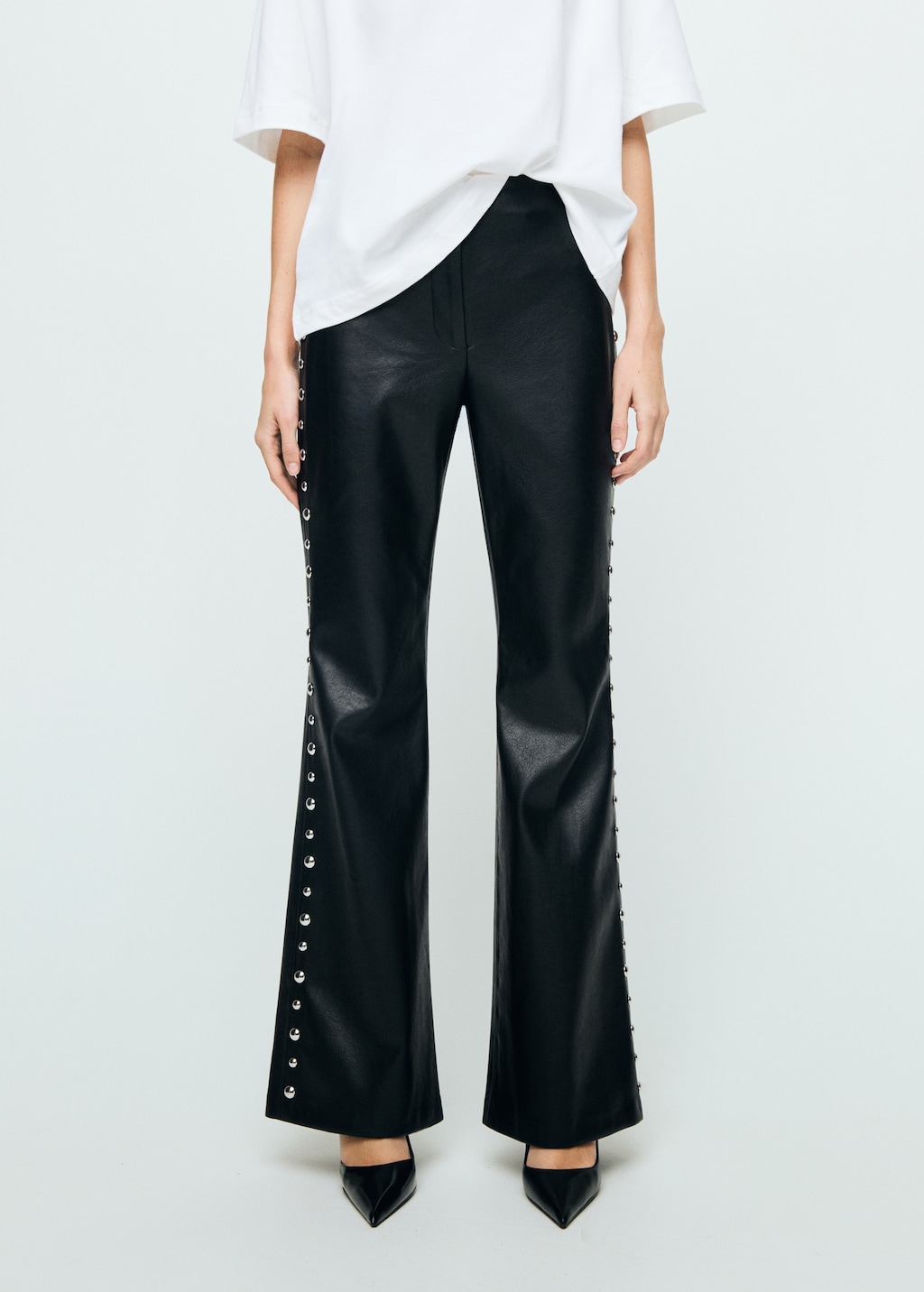 Studded faux-leather trousers