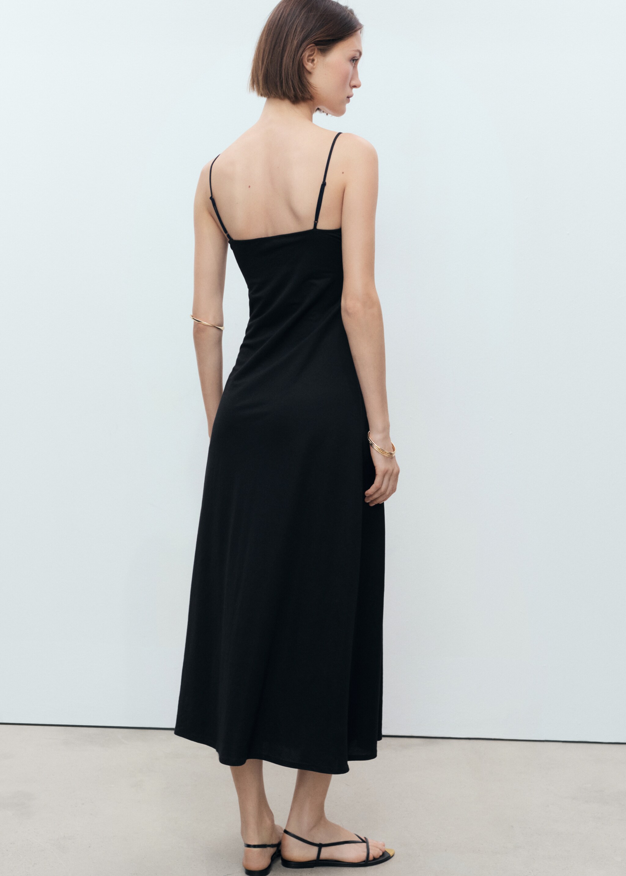 Long dress with bow neckline - Reverse of the article