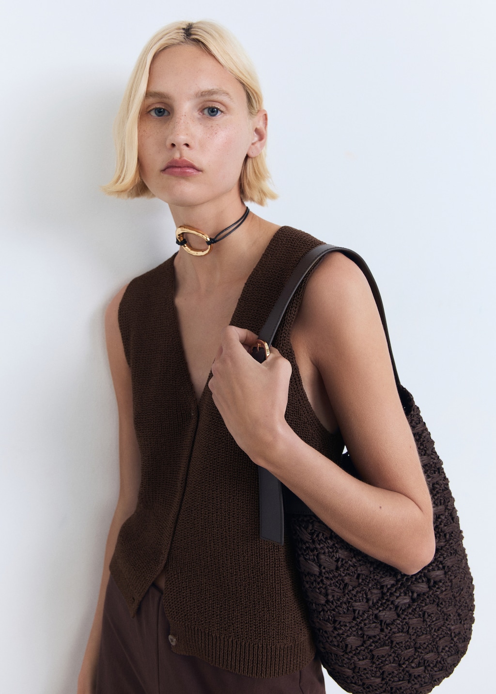 Knitted vest with lace pattern