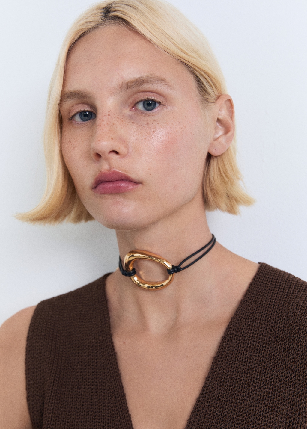 Knitted vest with lace pattern