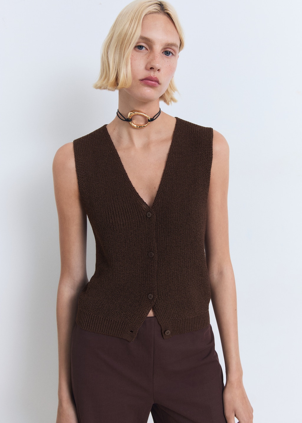 Knitted vest with lace pattern