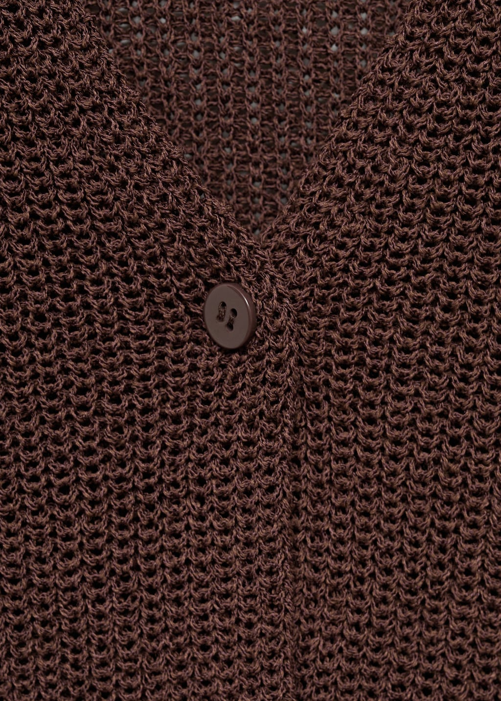 Knitted vest with lace pattern