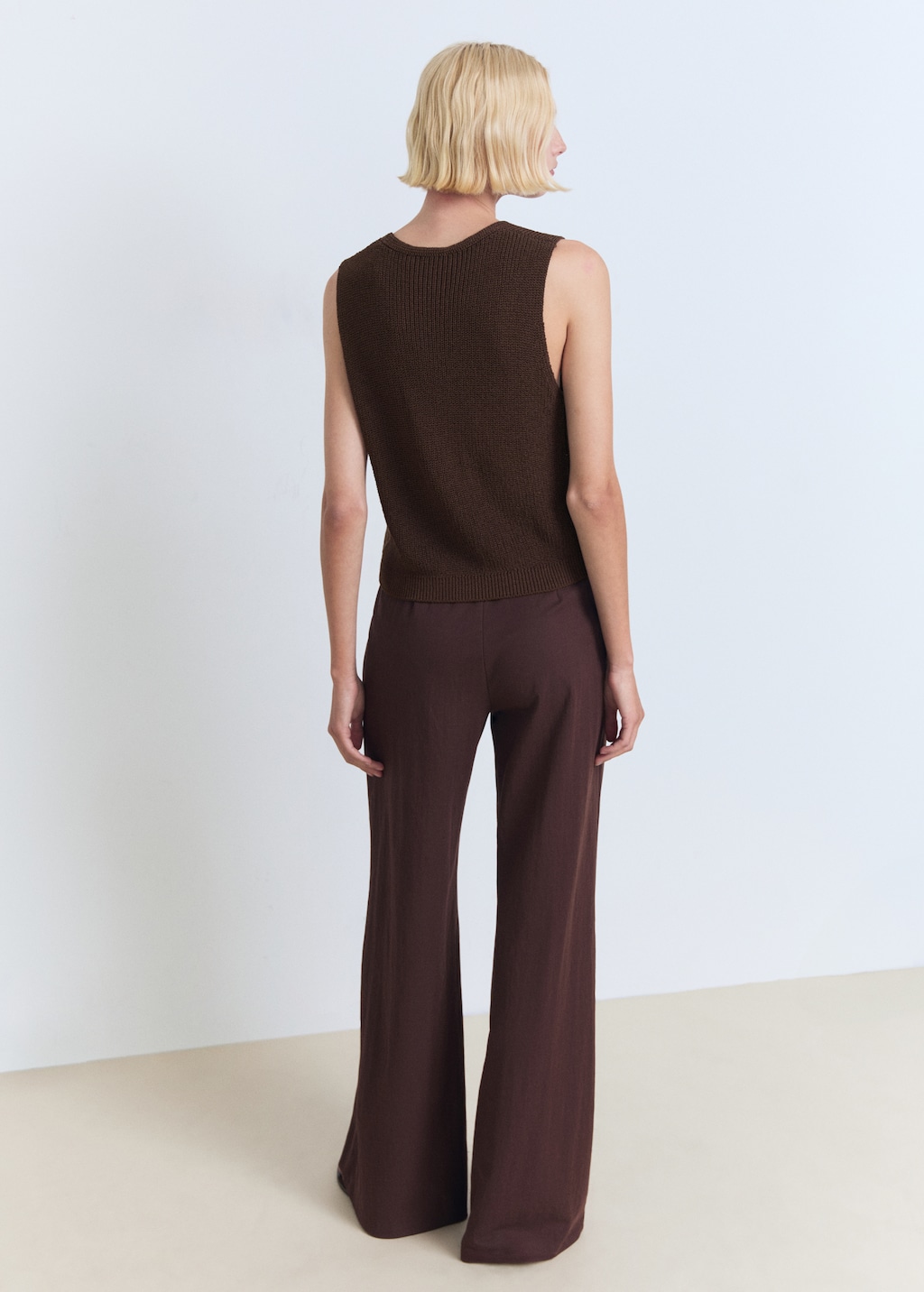 Knitted vest with lace pattern