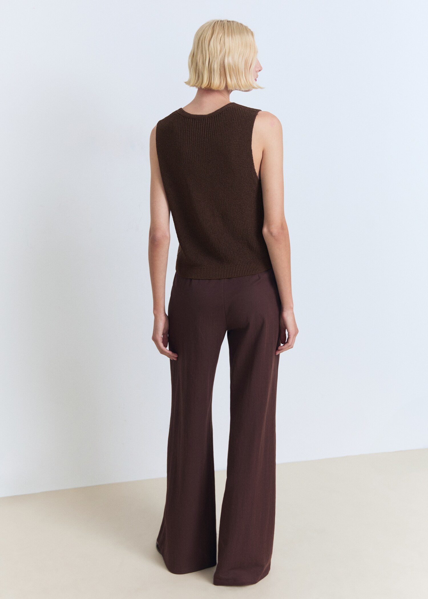 Openwork knitted waistcoat - Reverse of the article