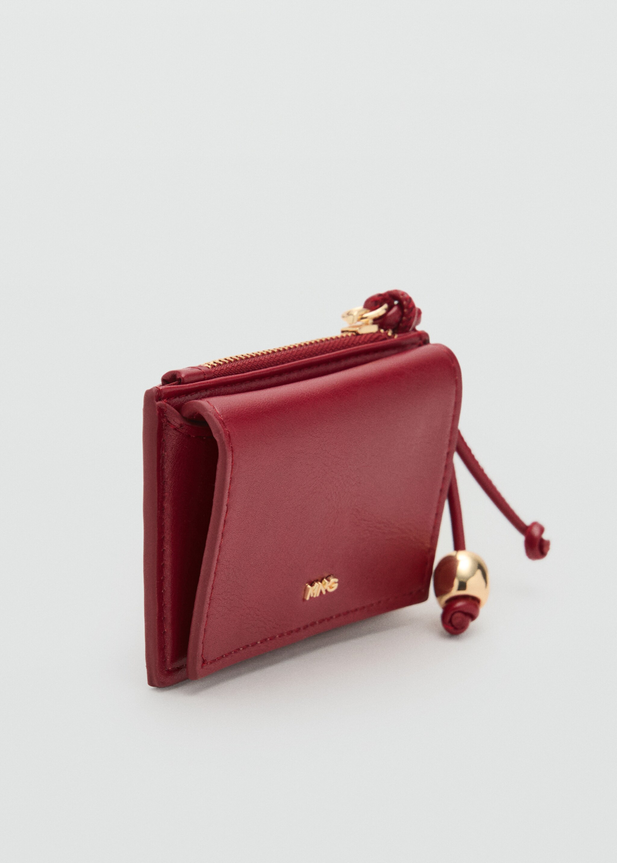 Mini-purse with bead detail - Medium plane