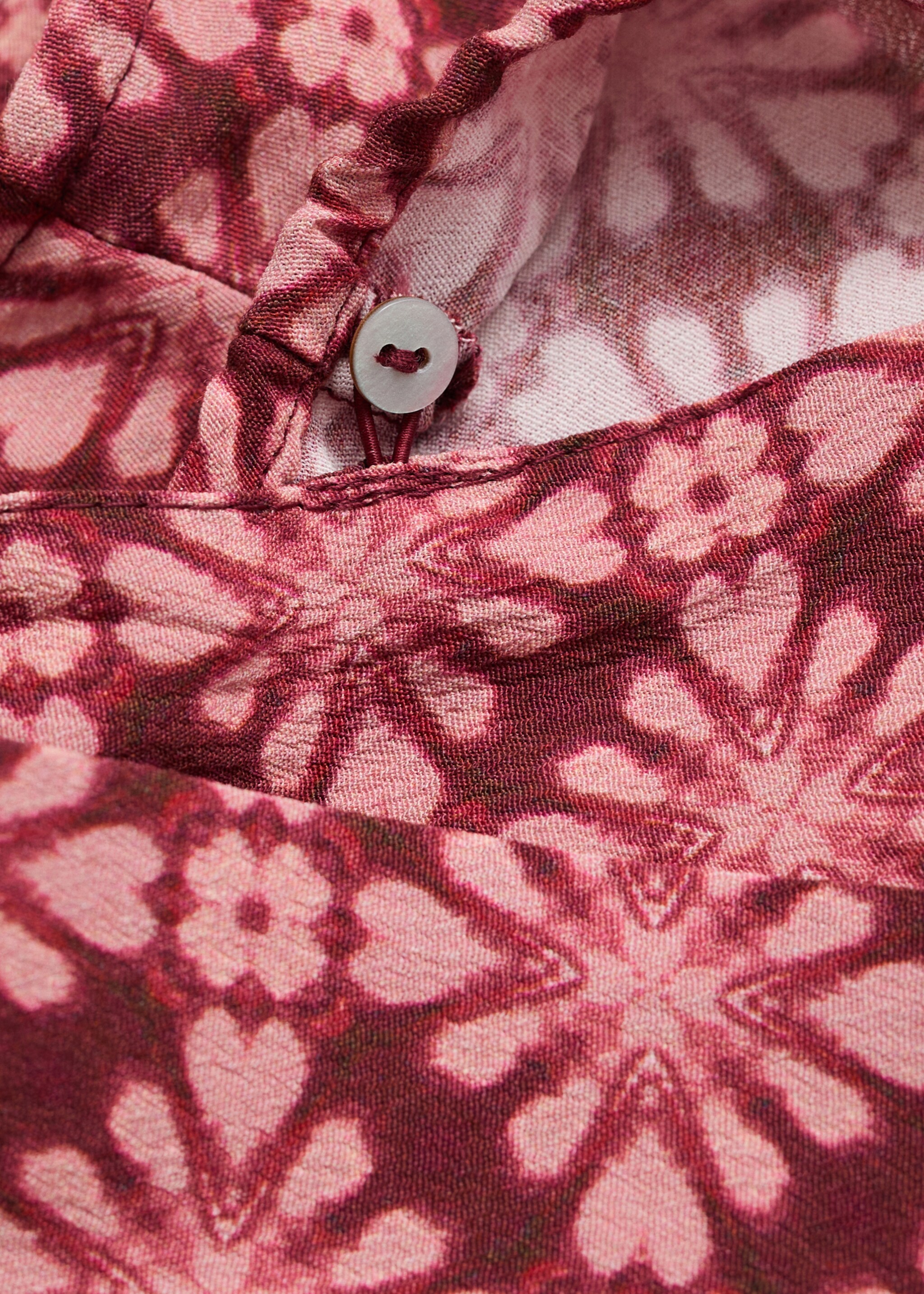 Asymmetrical blouse with bow at the neck - Details of the article 0
