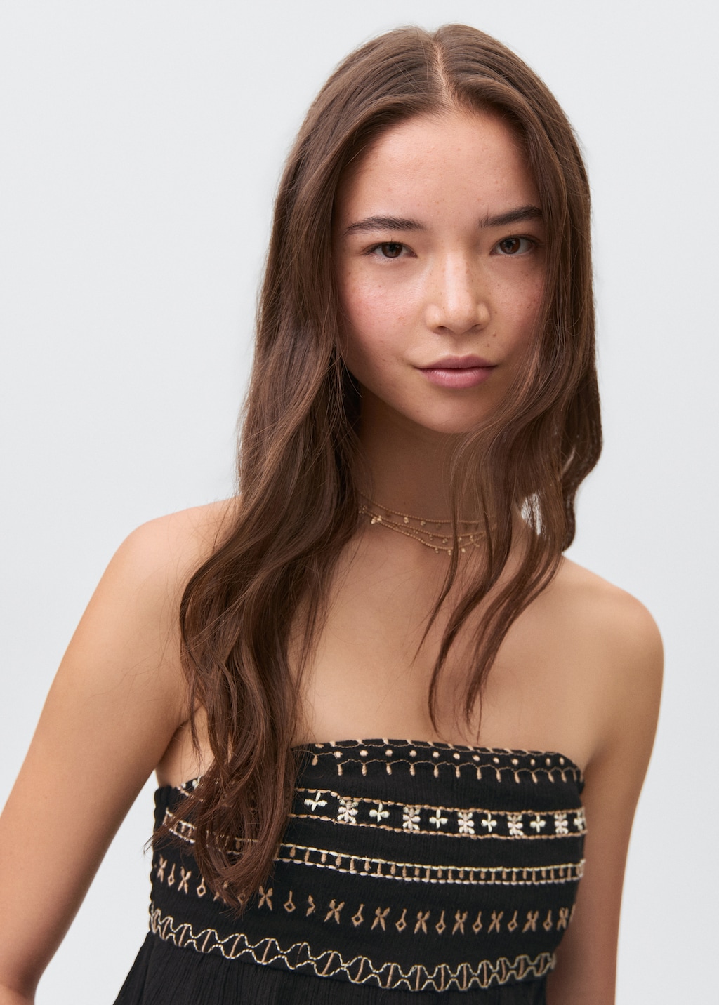 Embroidered strapless top