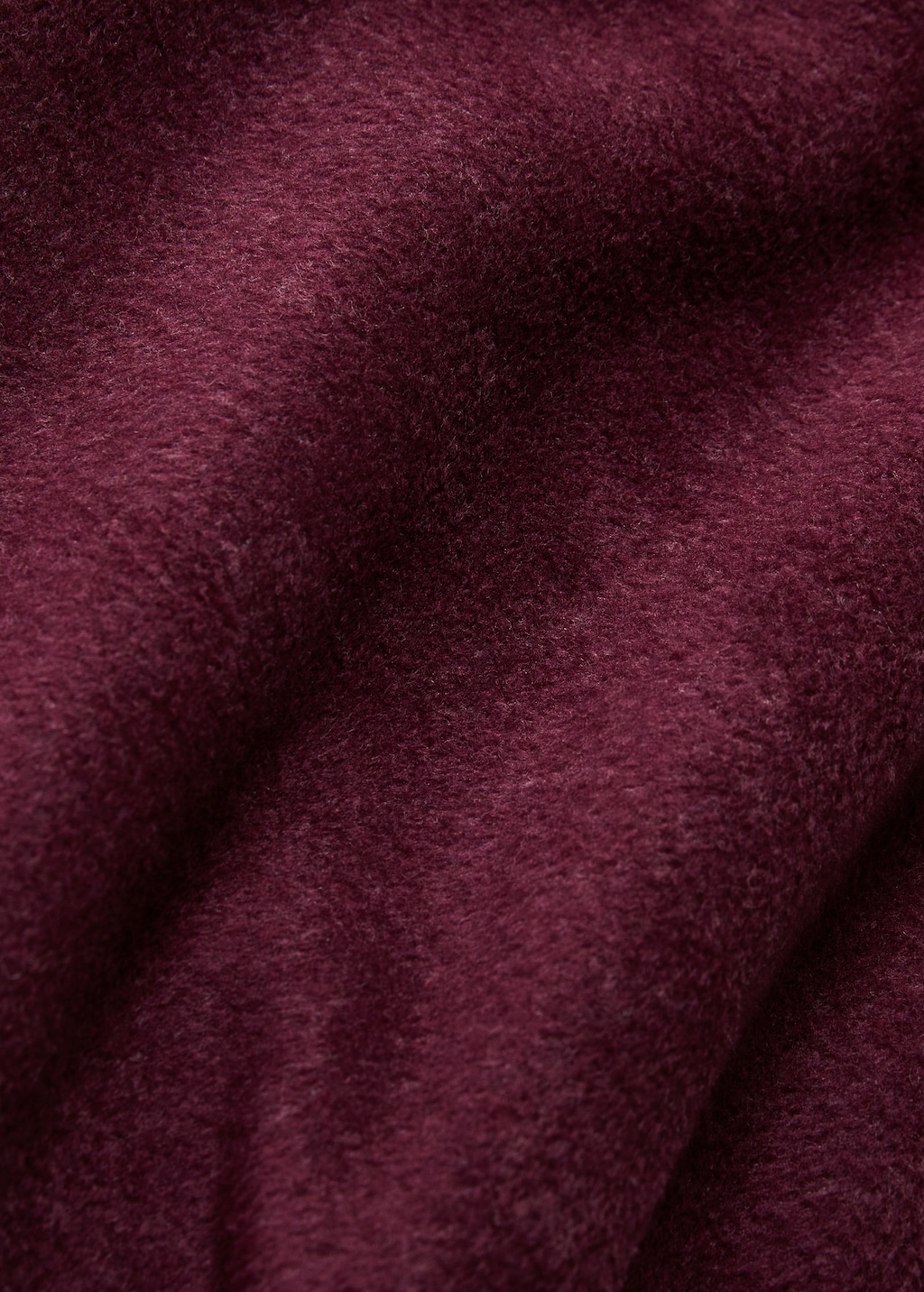 Soft fleece blanket with saddle-stitch detail