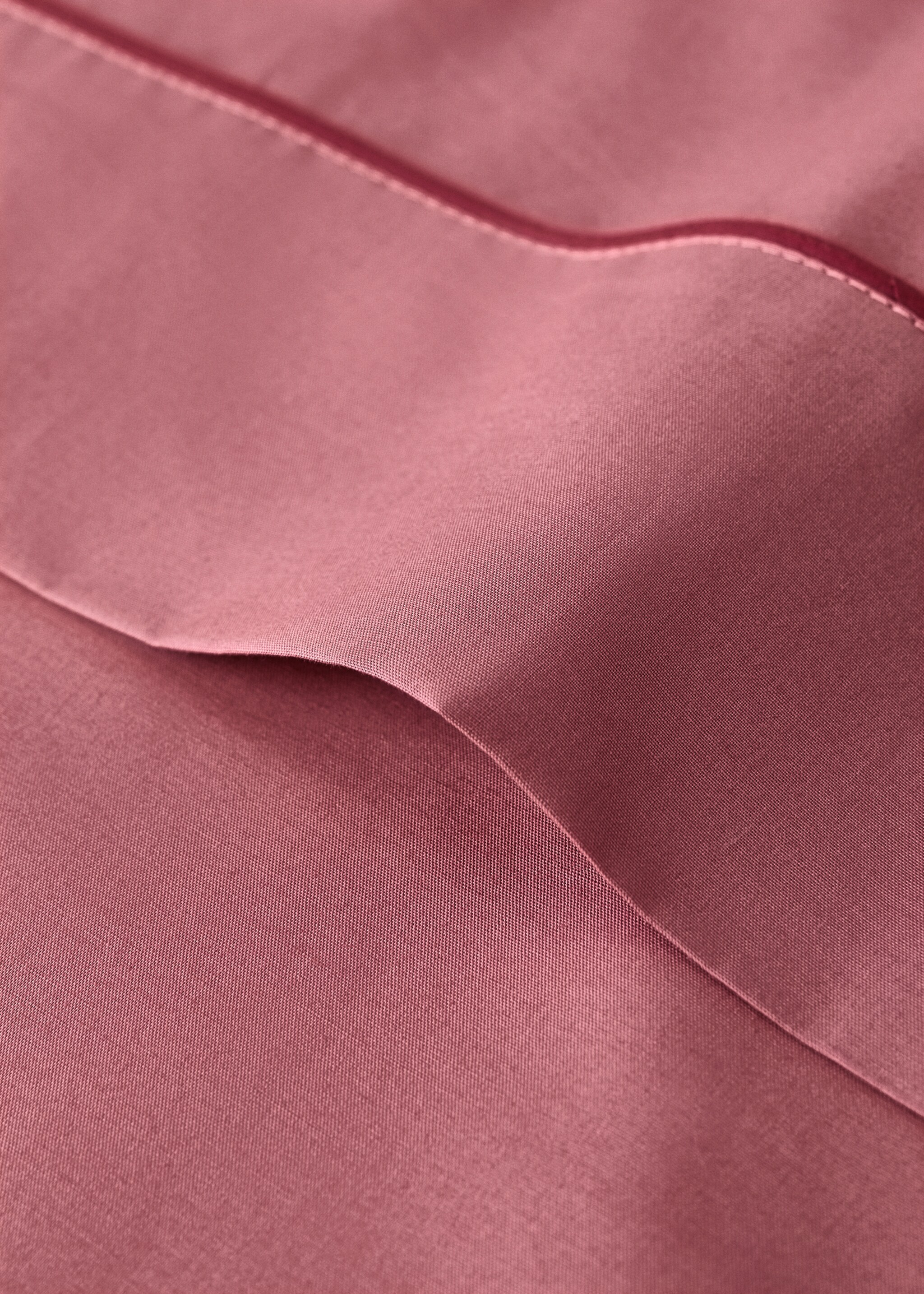 Reversible percale cotton top sheet with contrasting piping for cot - Details of the article 1, Pink. Ref: 17091544-00.