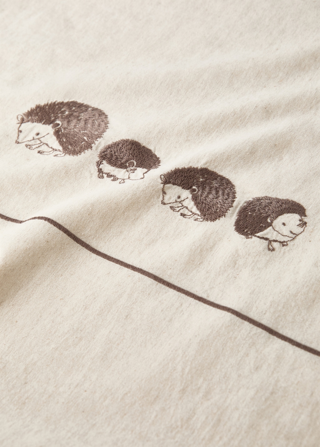 Cotton and linen duvet cover with embroidered hedgehogs for cot