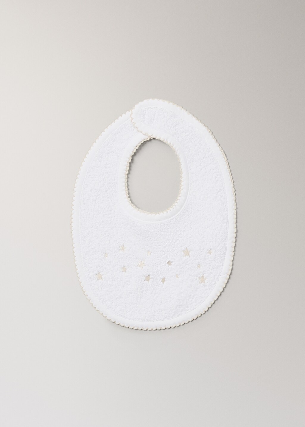 Embroidered cotton bib with stars