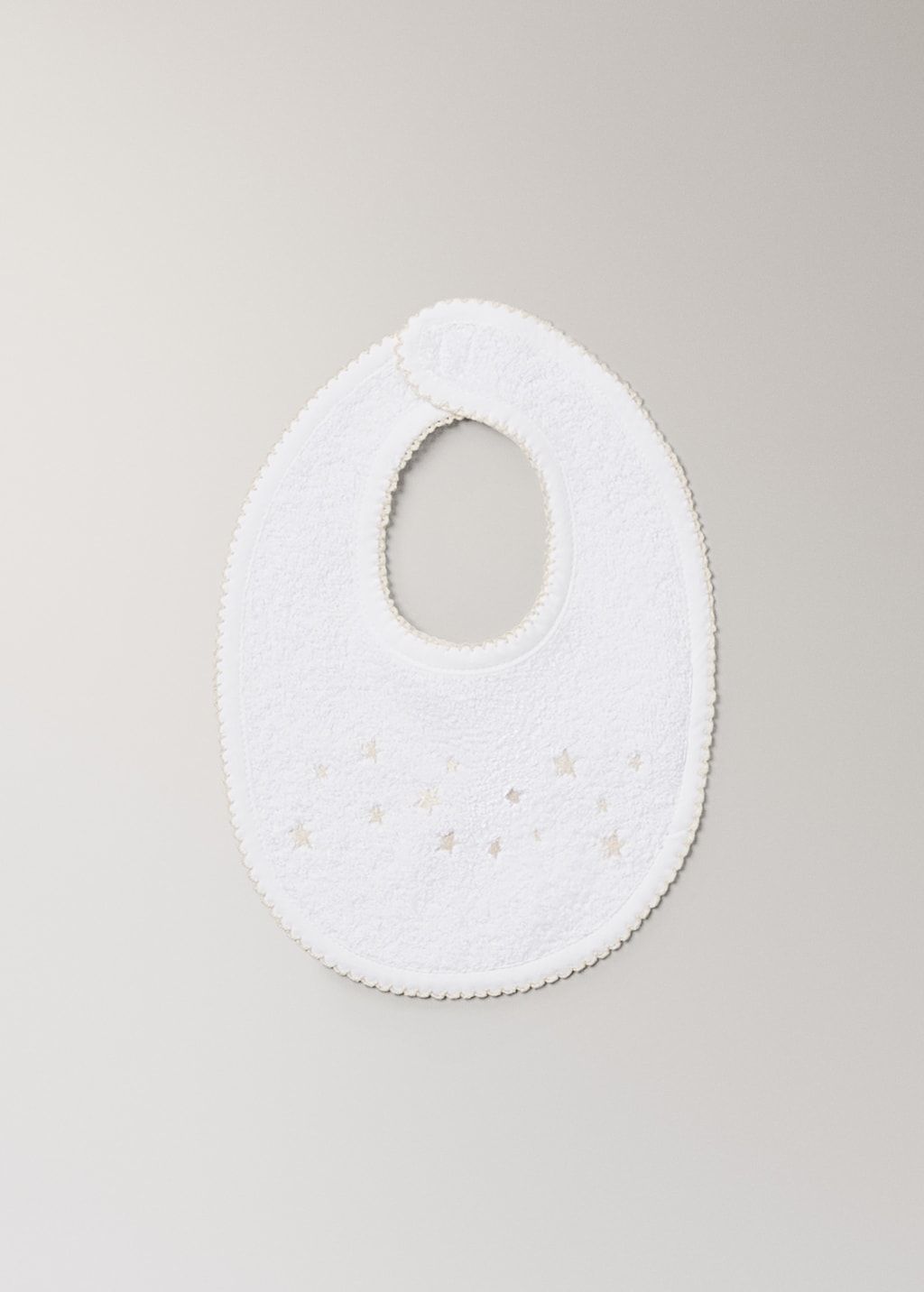 Embroidered cotton bib with stars
