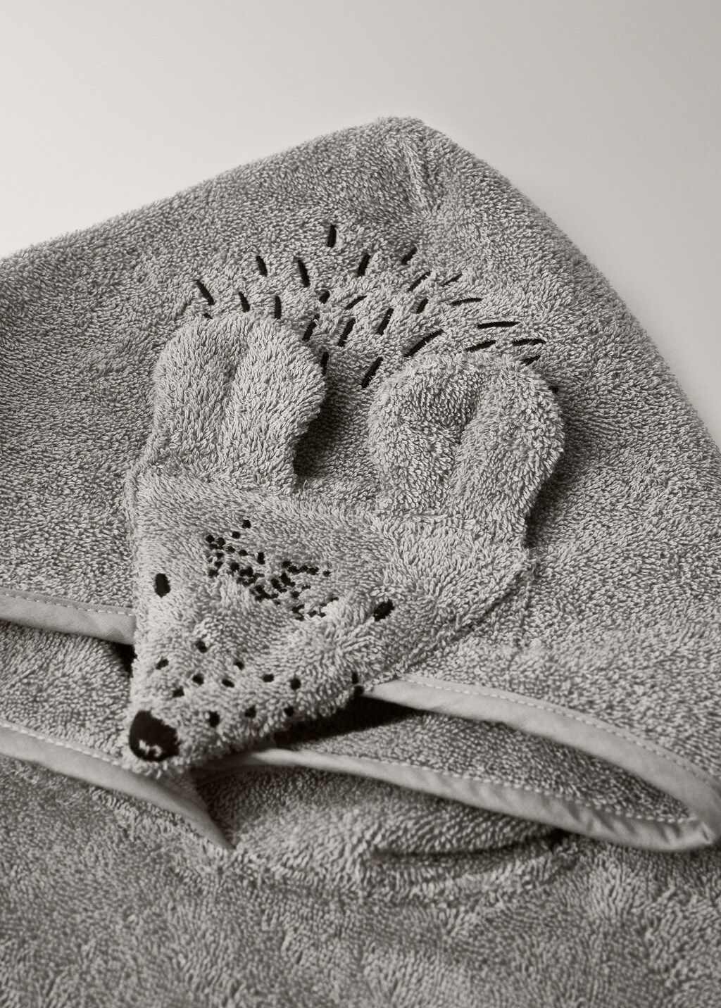 Children's bath poncho with decorative hood detail