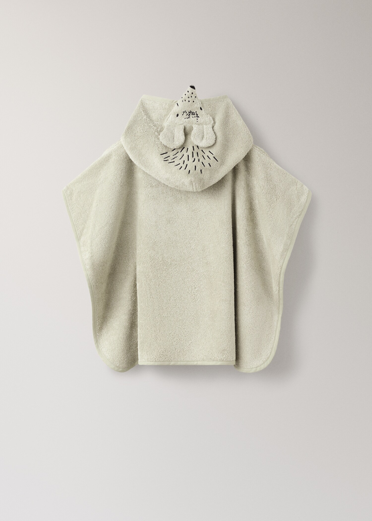 Barnbadrock med dekorativ detalj på huvan - Detaljer om artikeln 1