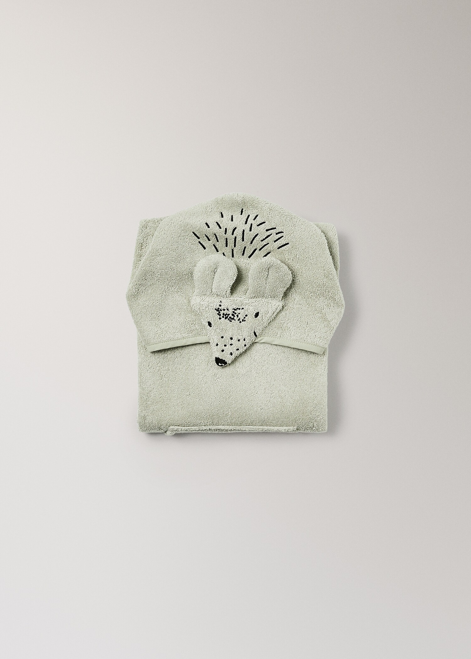 Barnbadrock med dekorativ detalj på huvan - Detaljer om artikeln 4