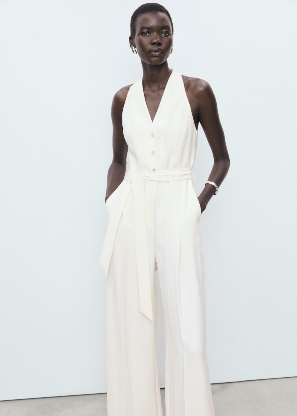 Halter-neck jumpsuit with belt