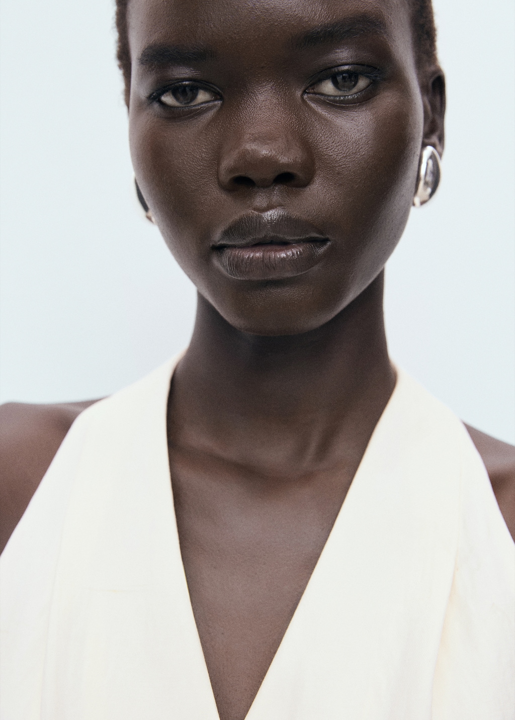 Halter-neck jumpsuit with belt