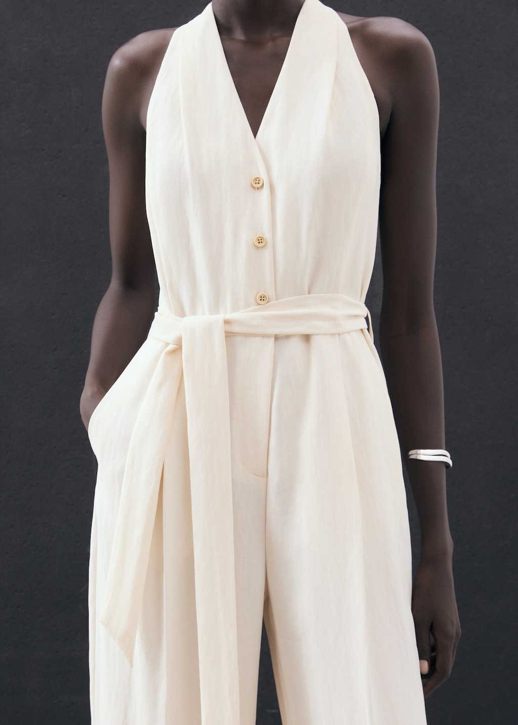 Halter-neck jumpsuit with belt
