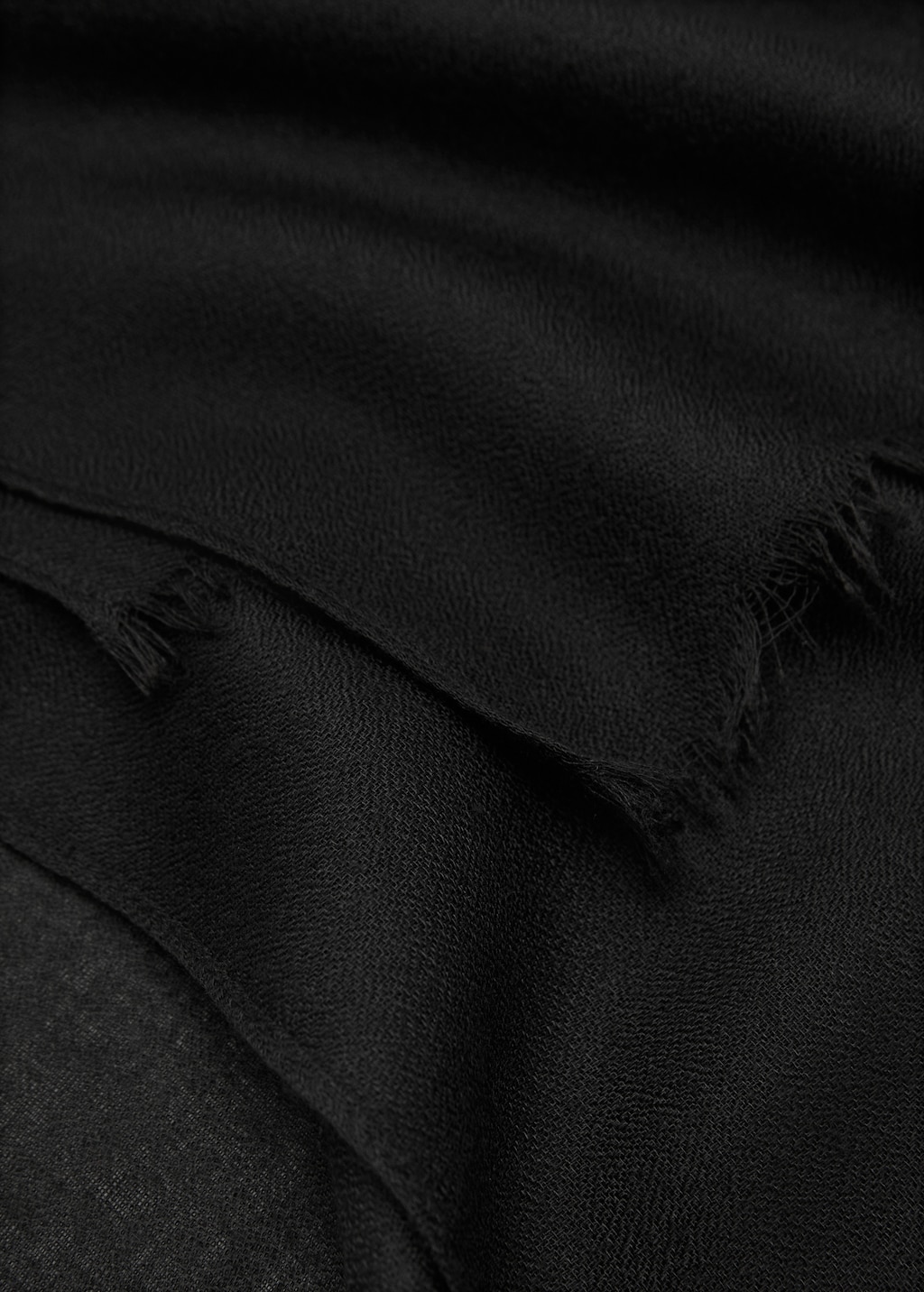 Plain shawl with frayed ends