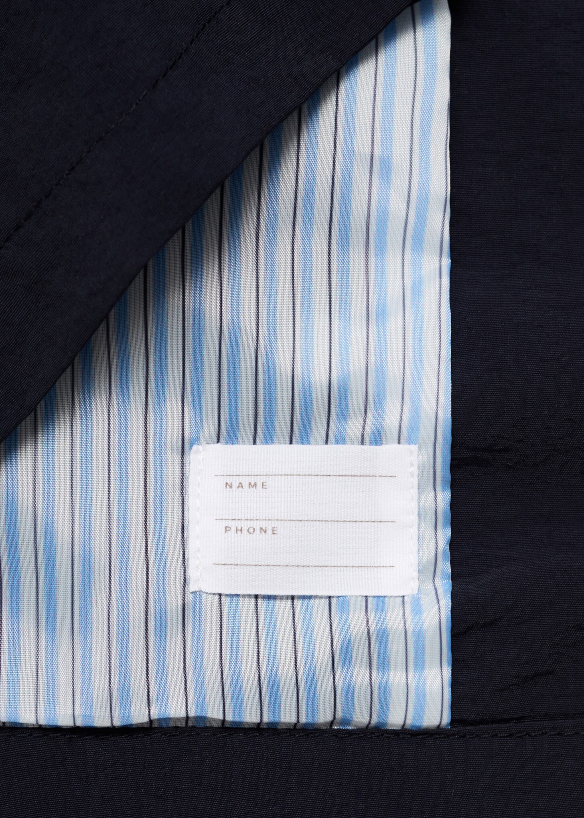 Trench coat with button detail - Details of the article 8
