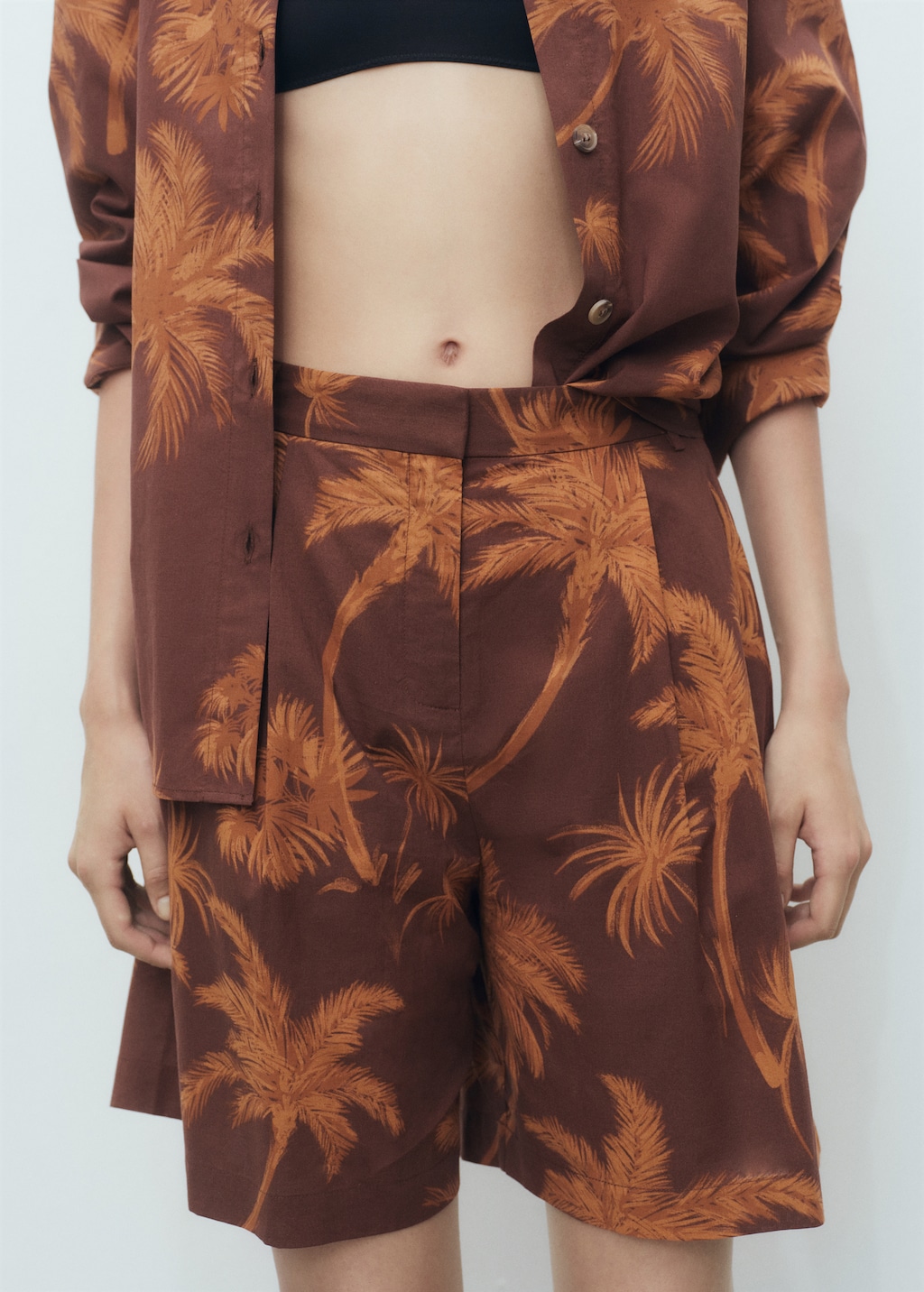 Cotton bermuda shorts with palm-tree print