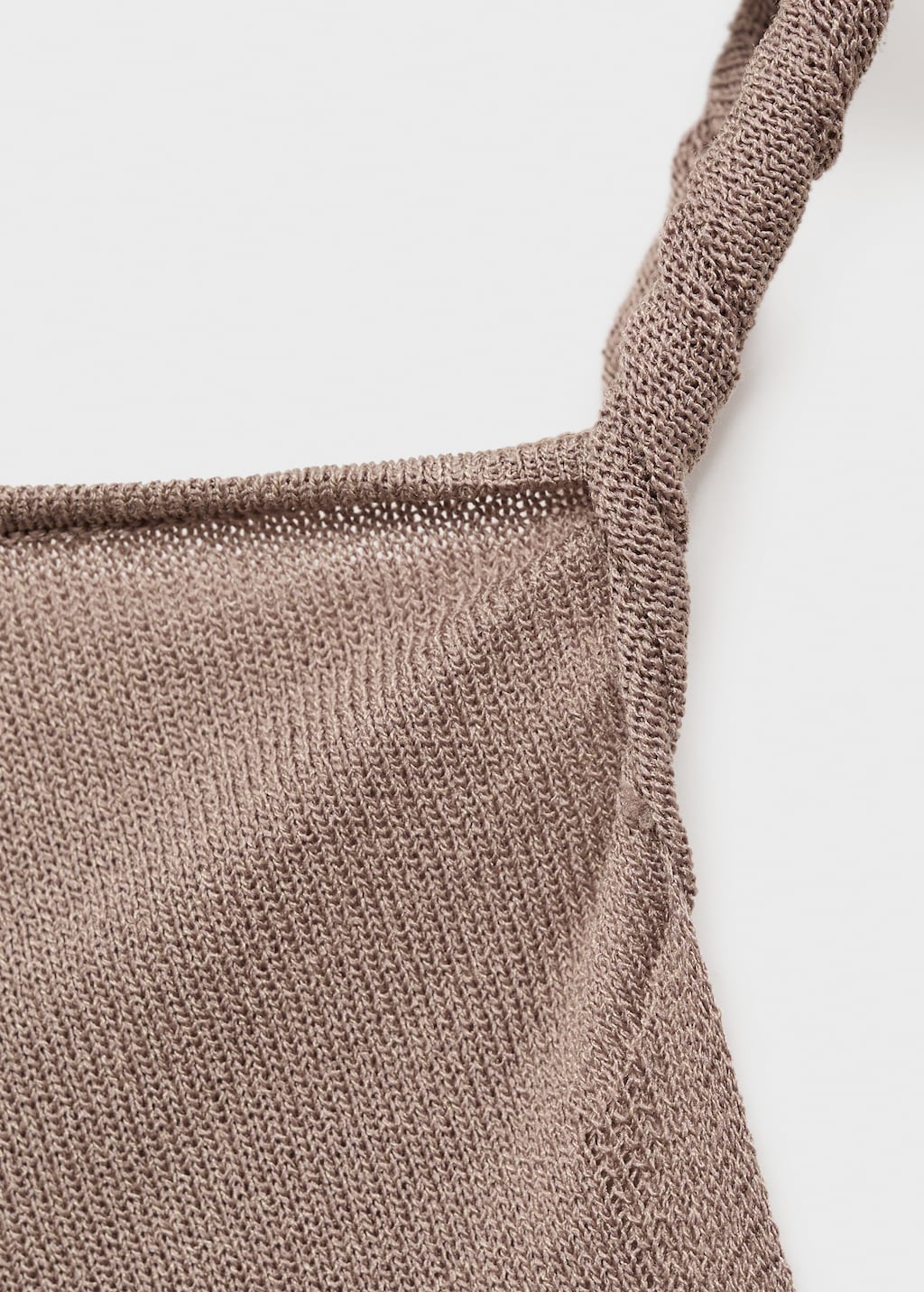 Asymmetrical knitted top with straps