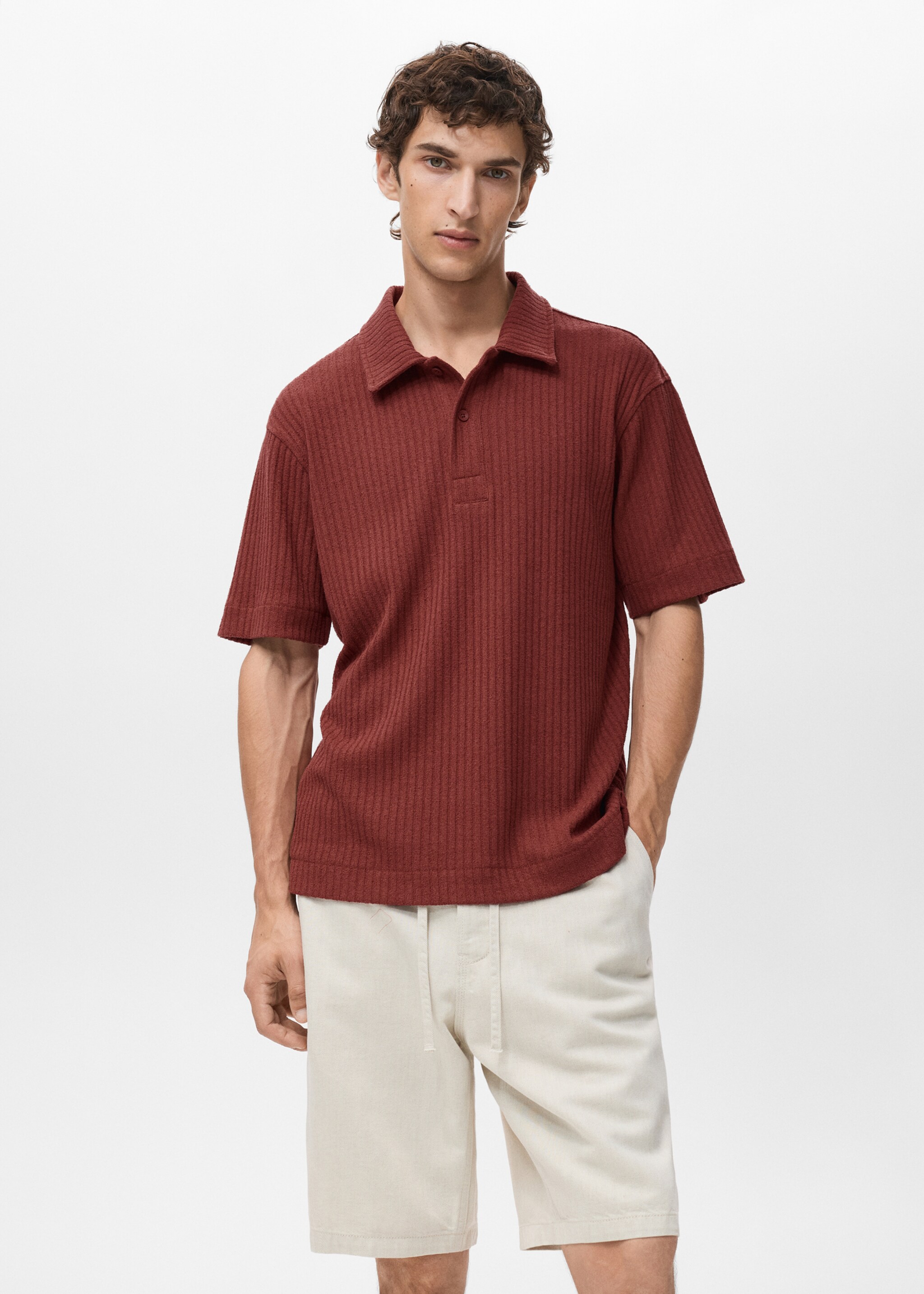 Polo de malha com textura - Plano médio