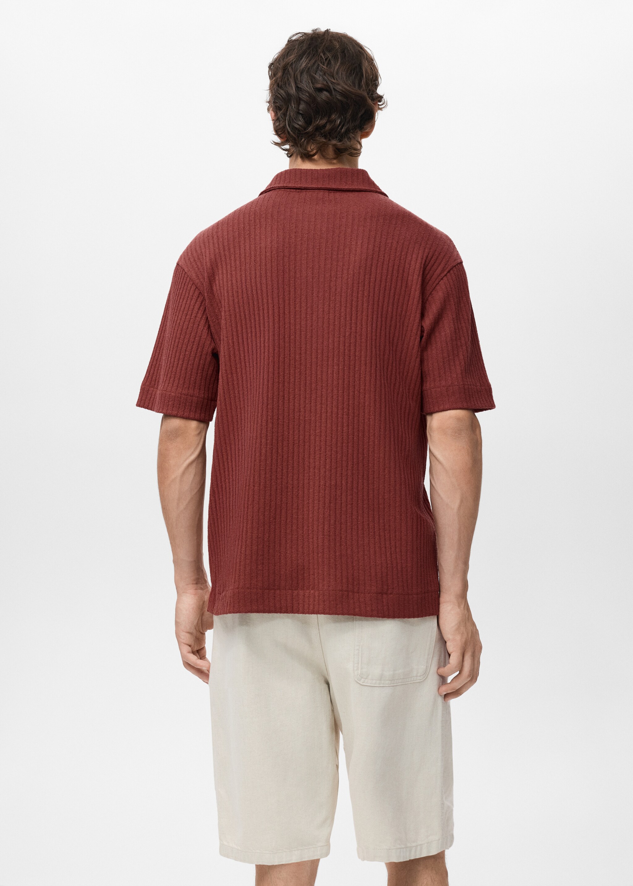 Polo de malha com textura - Verso do artigo