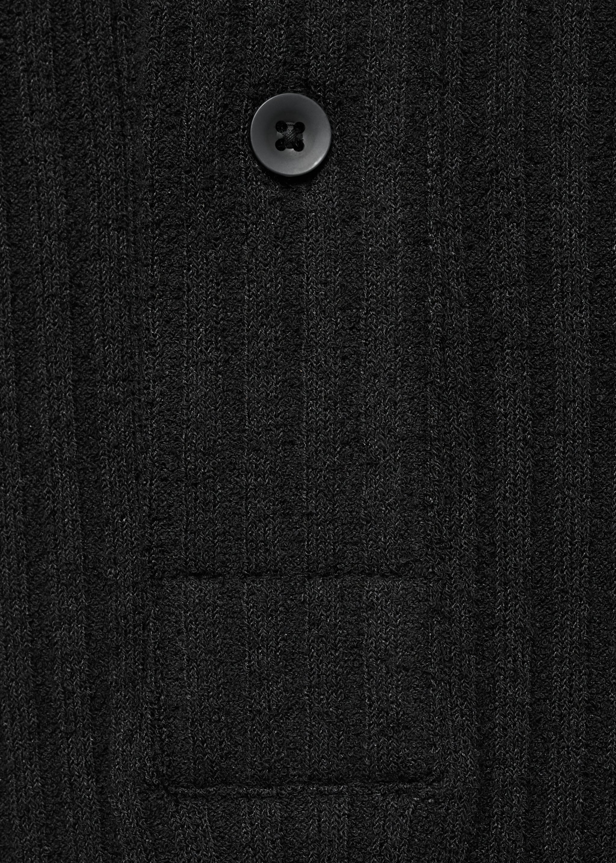 Polo de malha com textura - Pormenor do artigo 8