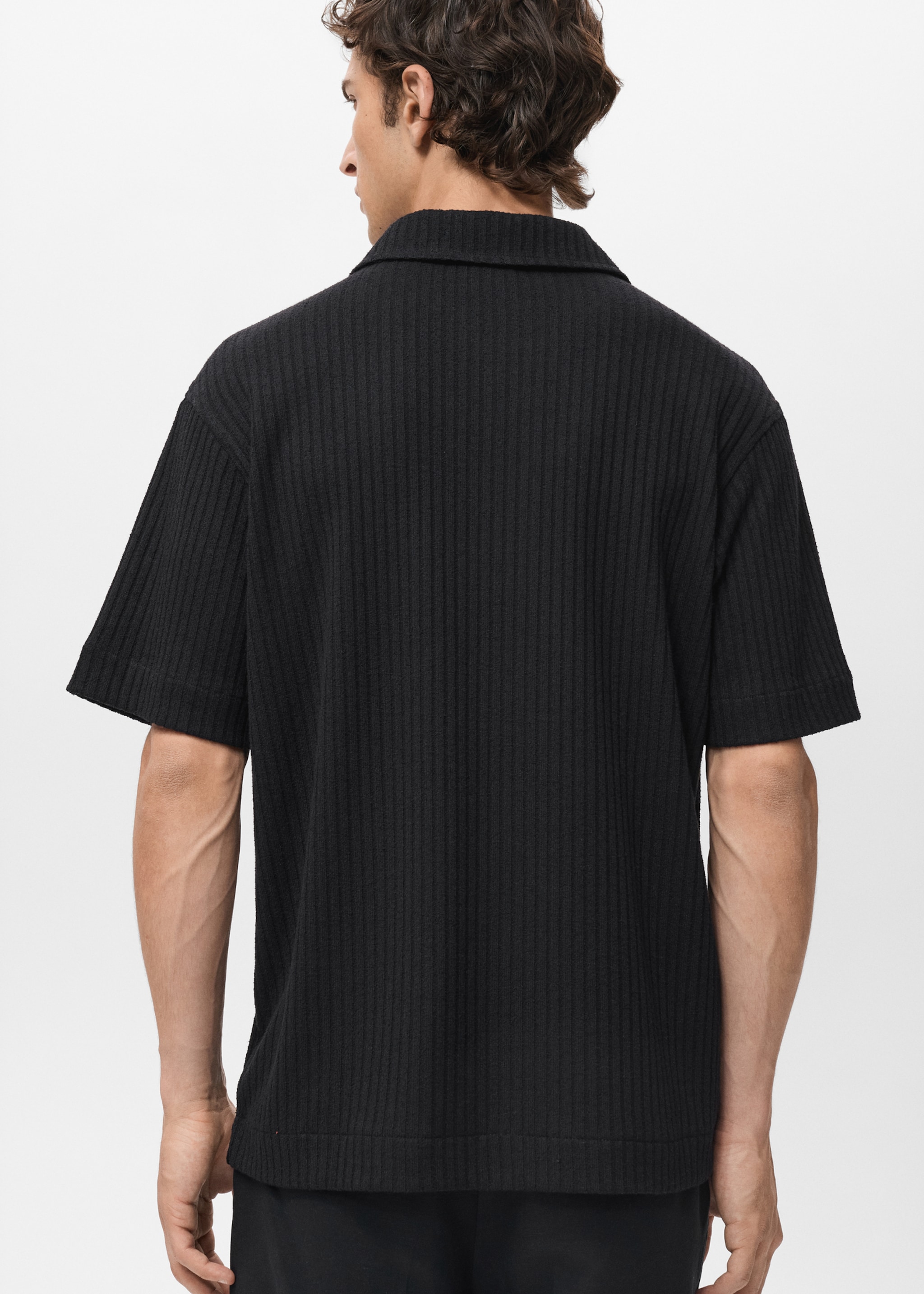 Polo de malha com textura - Verso do artigo