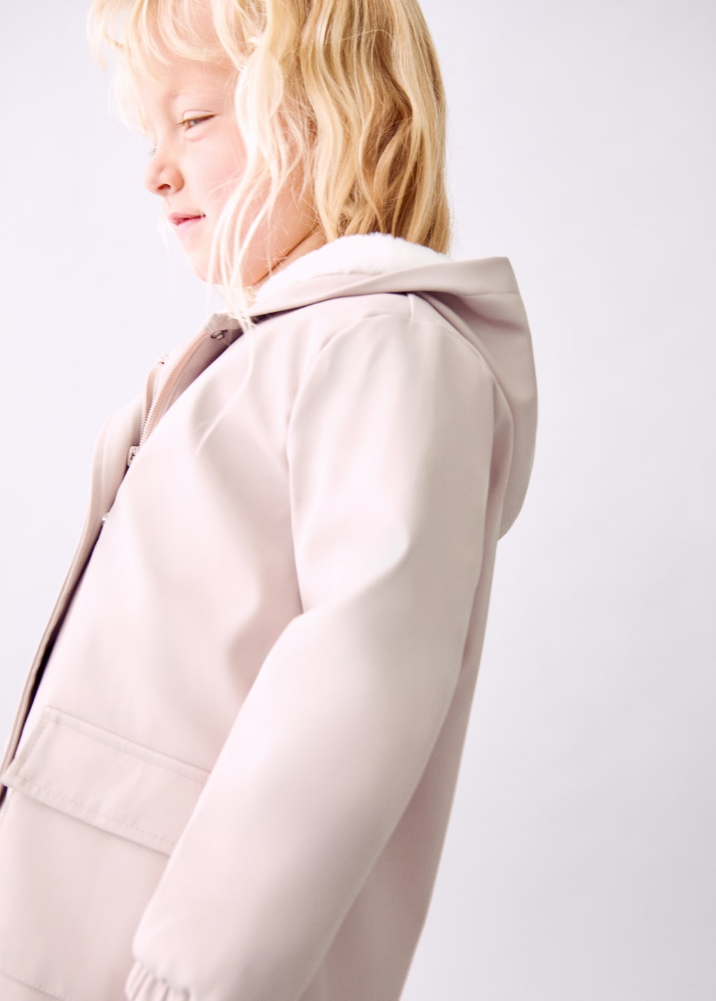 Rubberized coat with fur-effect lining