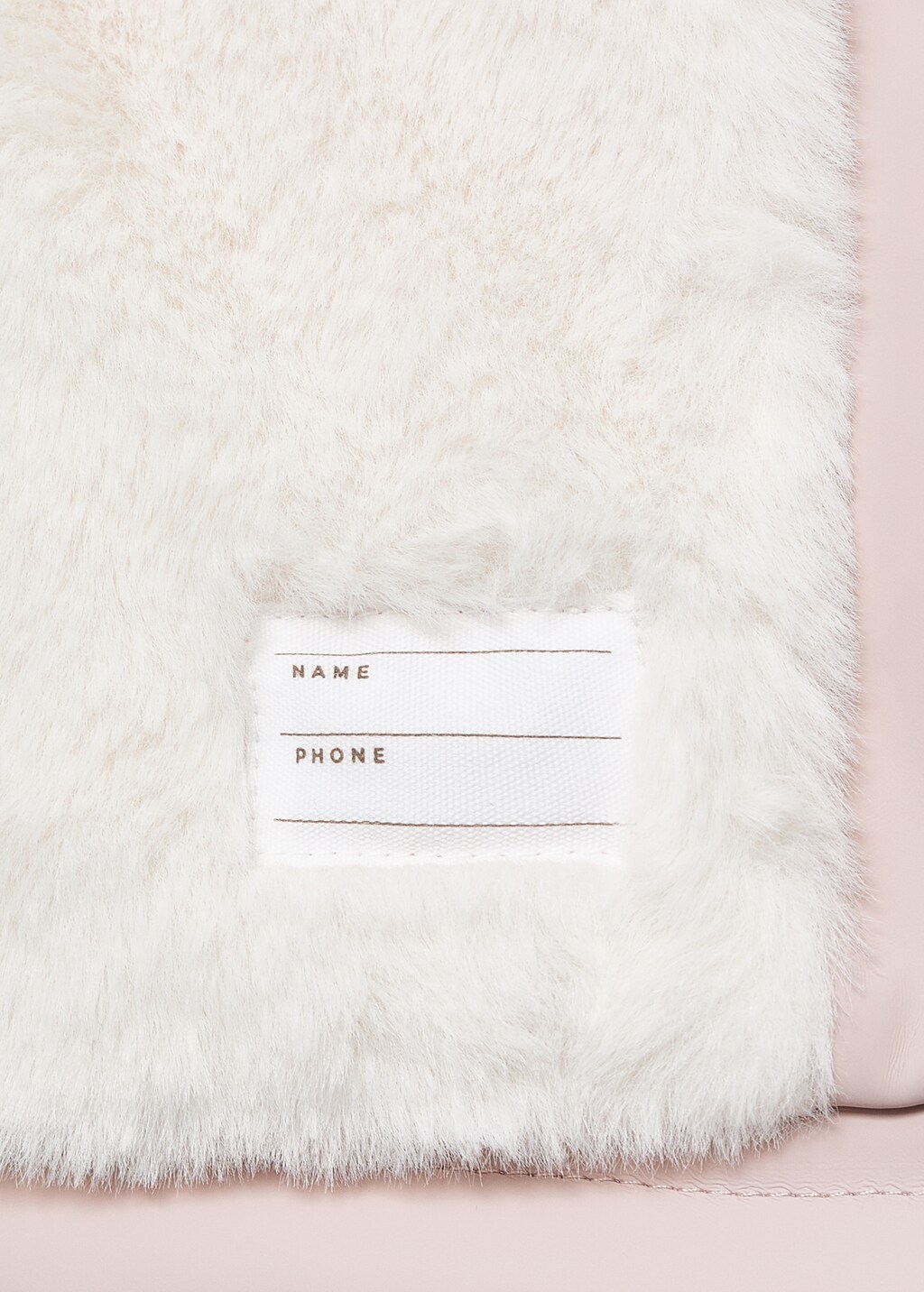 Rubberized coat with fur-effect lining