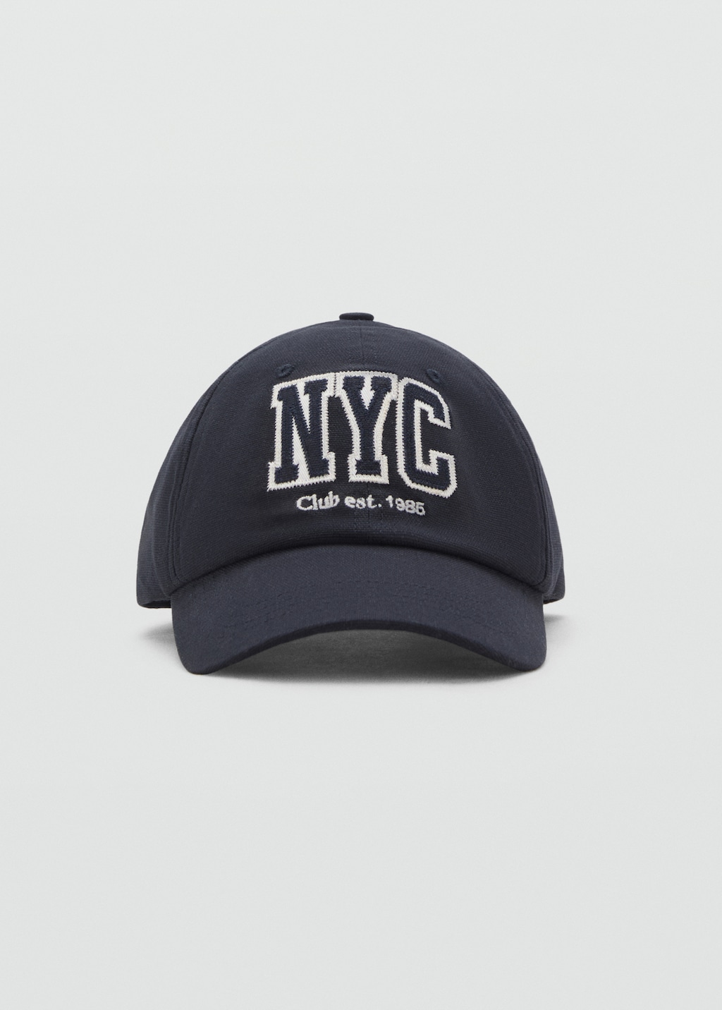 Cap with embroidered letter