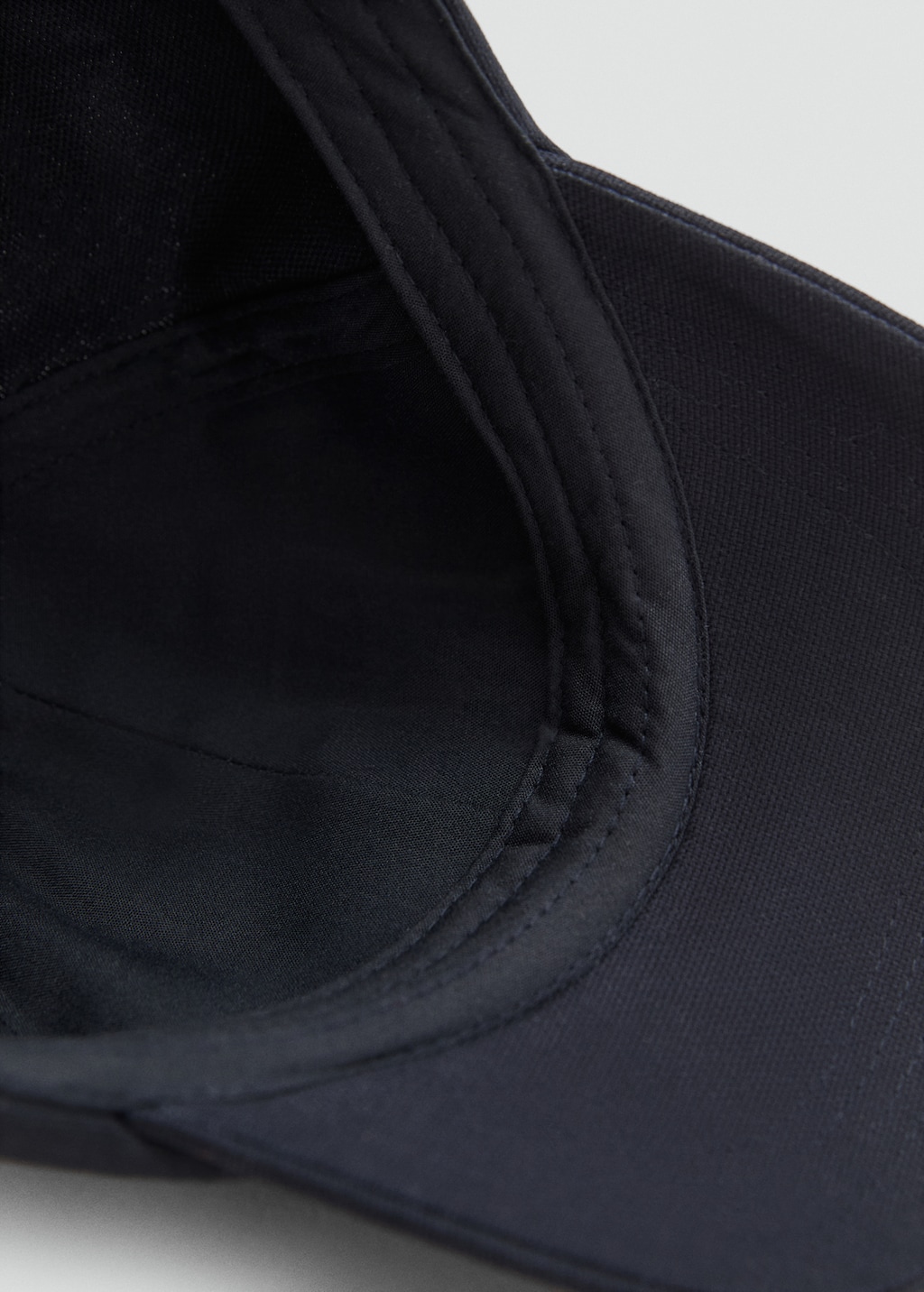 Cap with embroidered letter