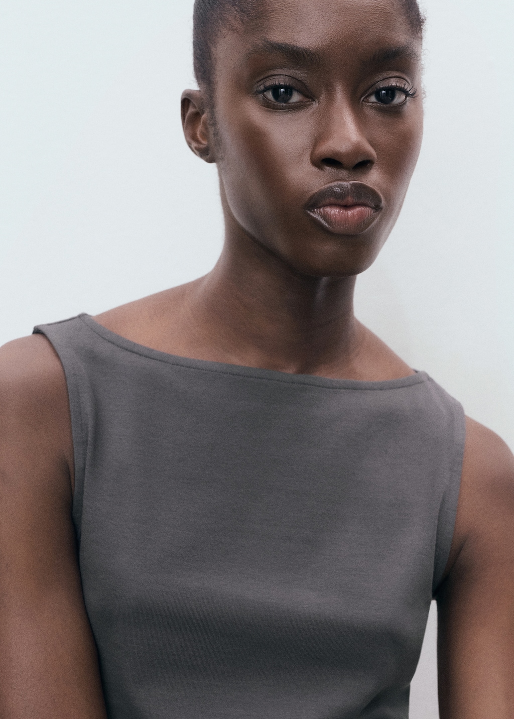 Boat-neck strapless top