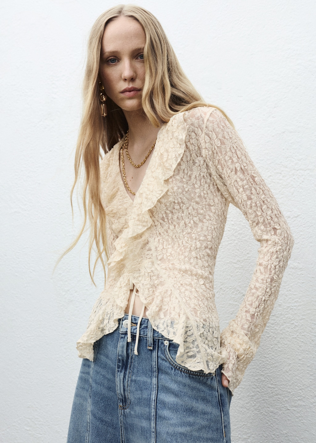 Lace blouse with ruffles