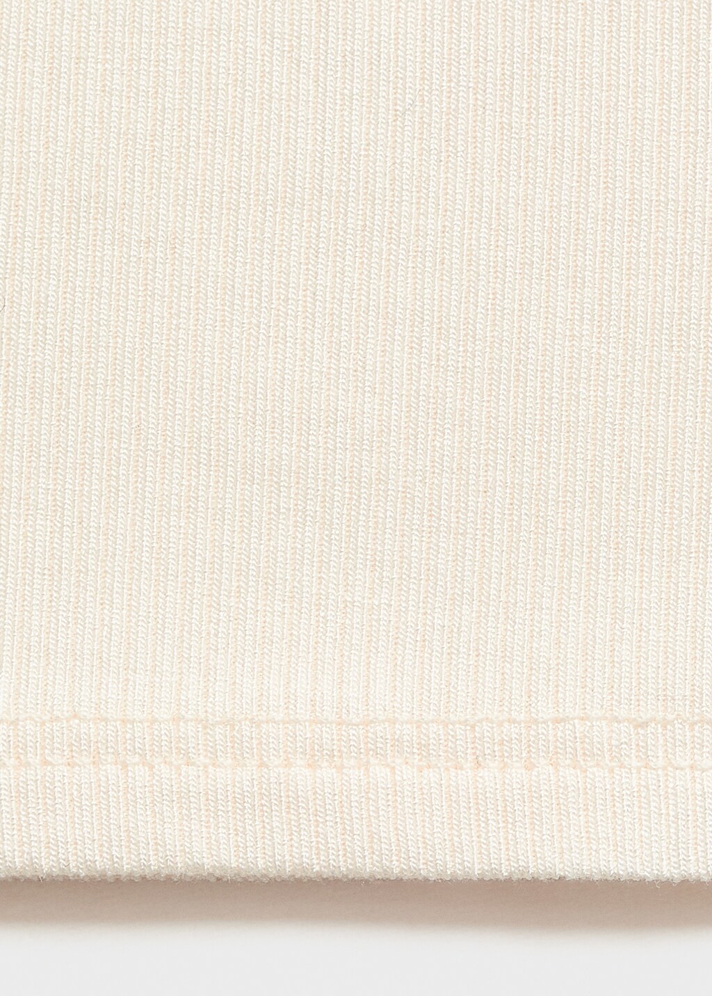 Top with perforated neckline