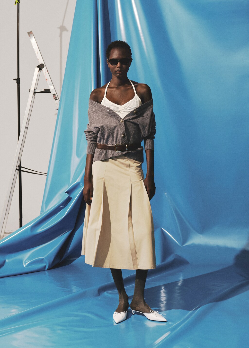 Top with perforated neckline